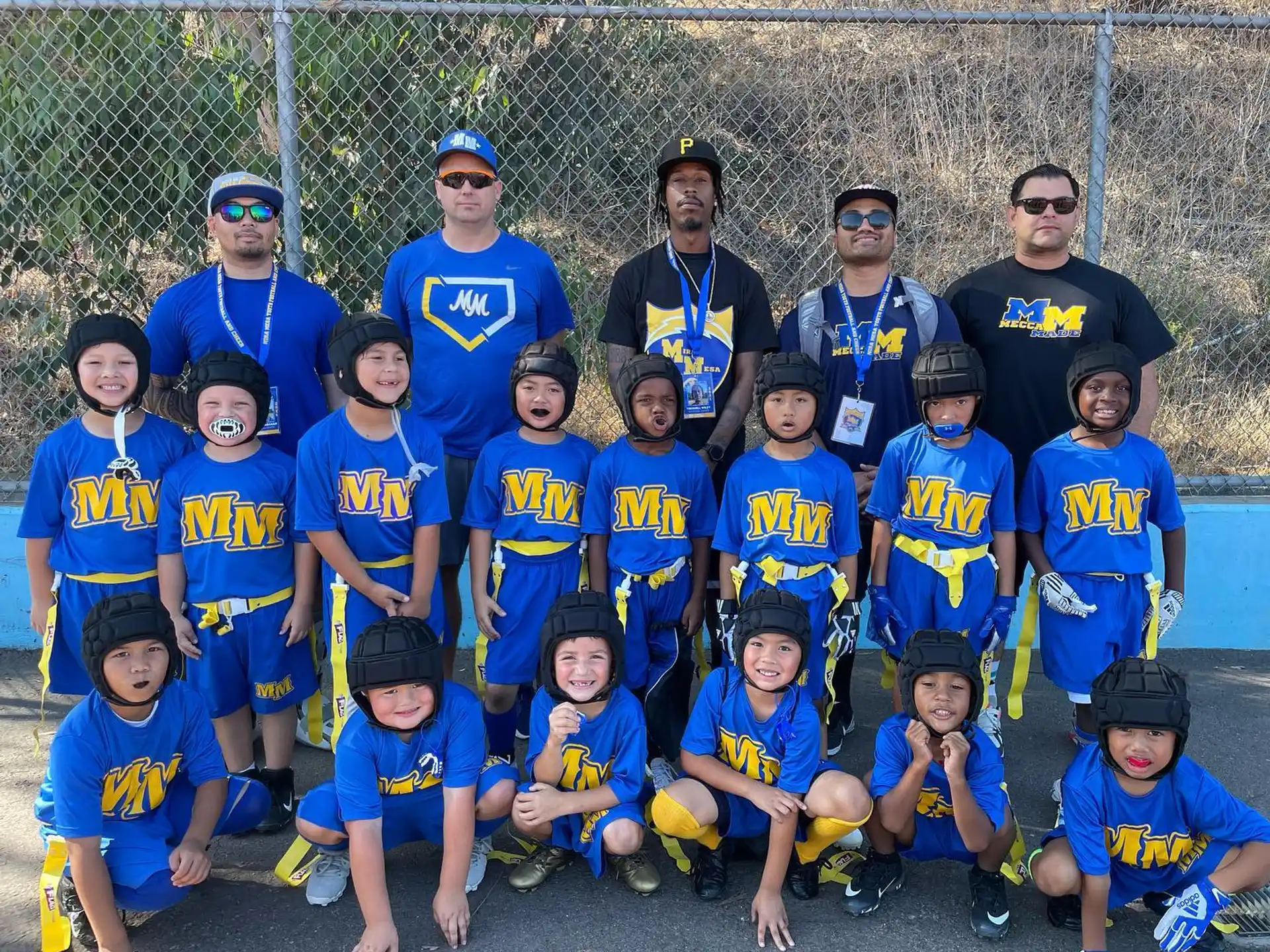 a group of people in blue uniforms