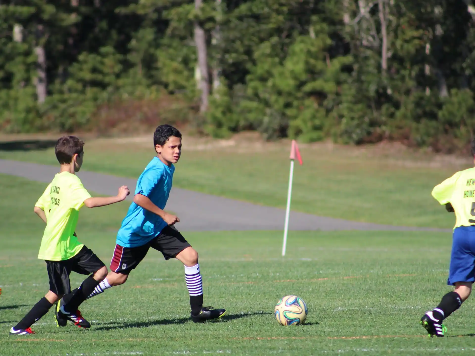 a group of boys playing football