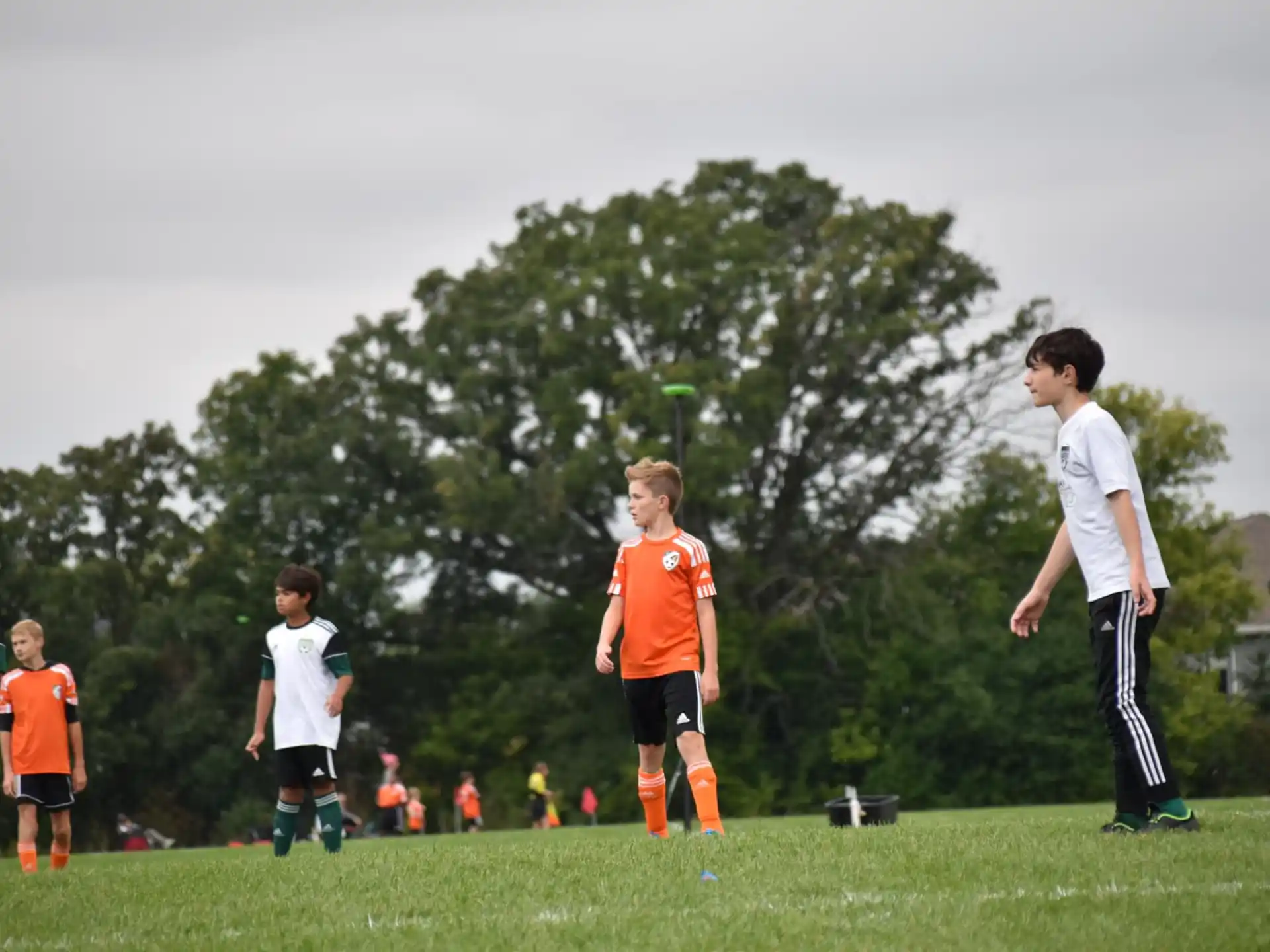 a group of boys playing football