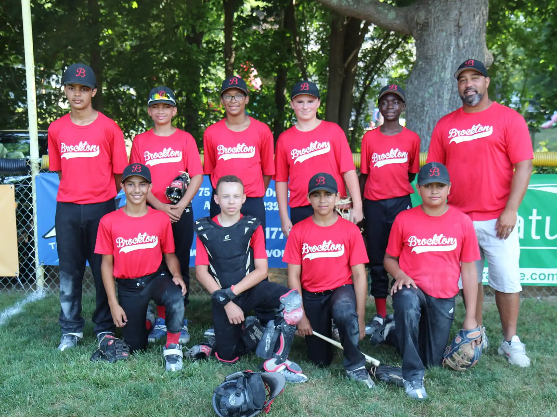 a group of people wearing red shirts