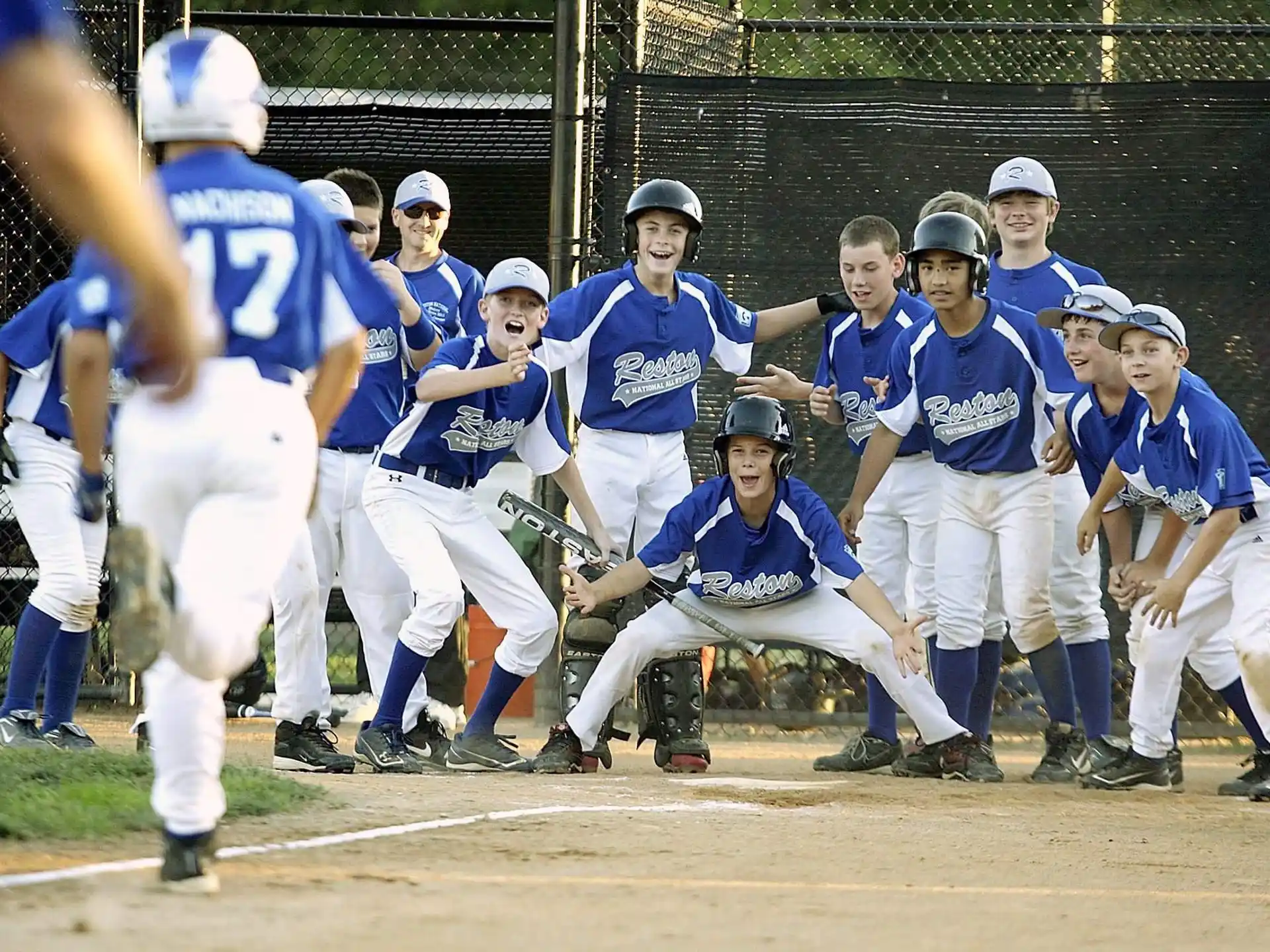 a group of people in baseball uniforms
