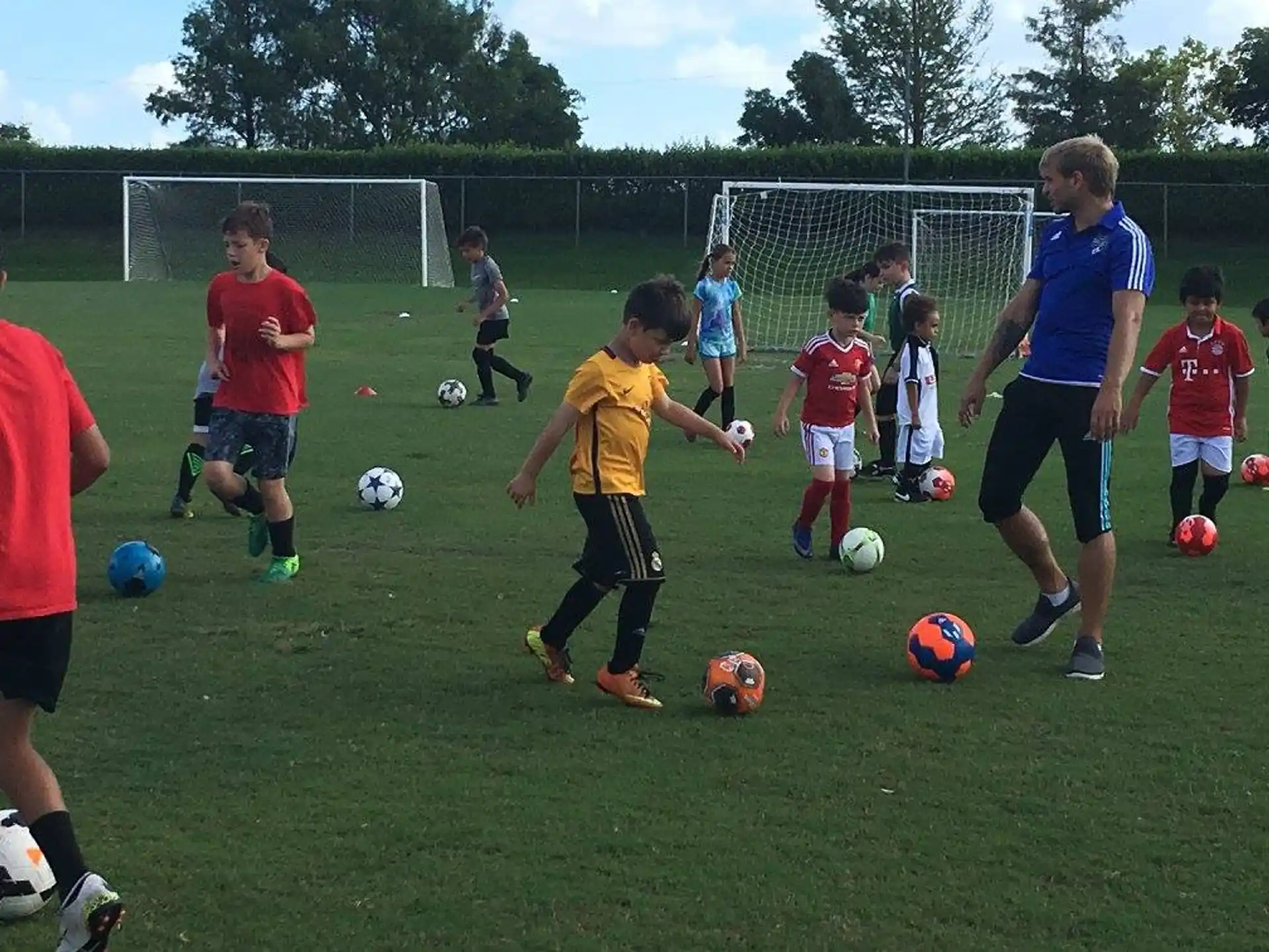 a group of kids playing football