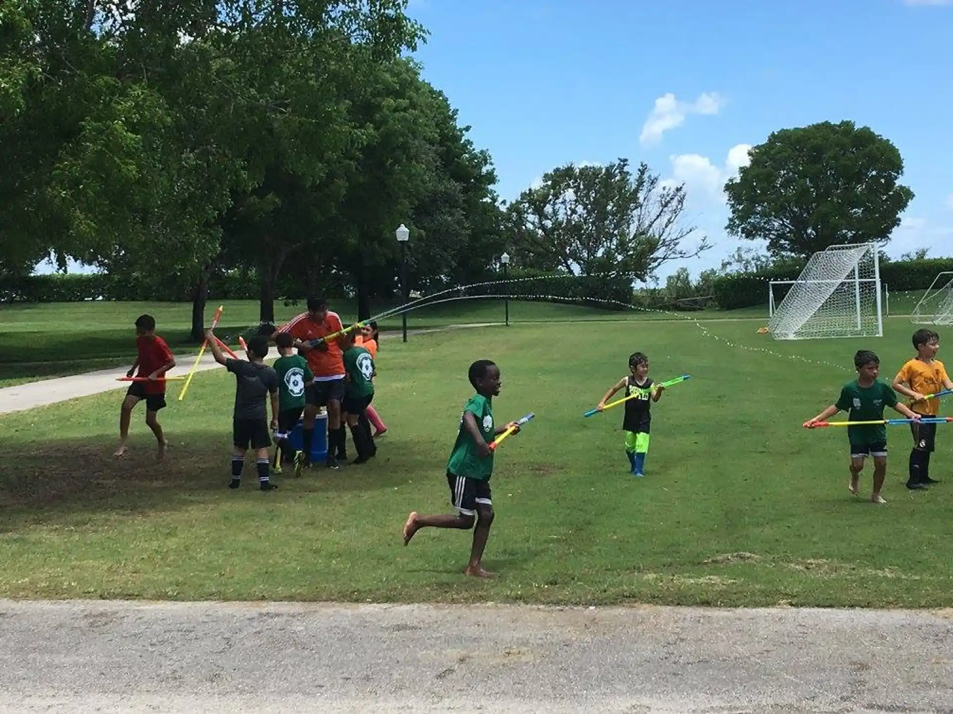 a group of kids playing football