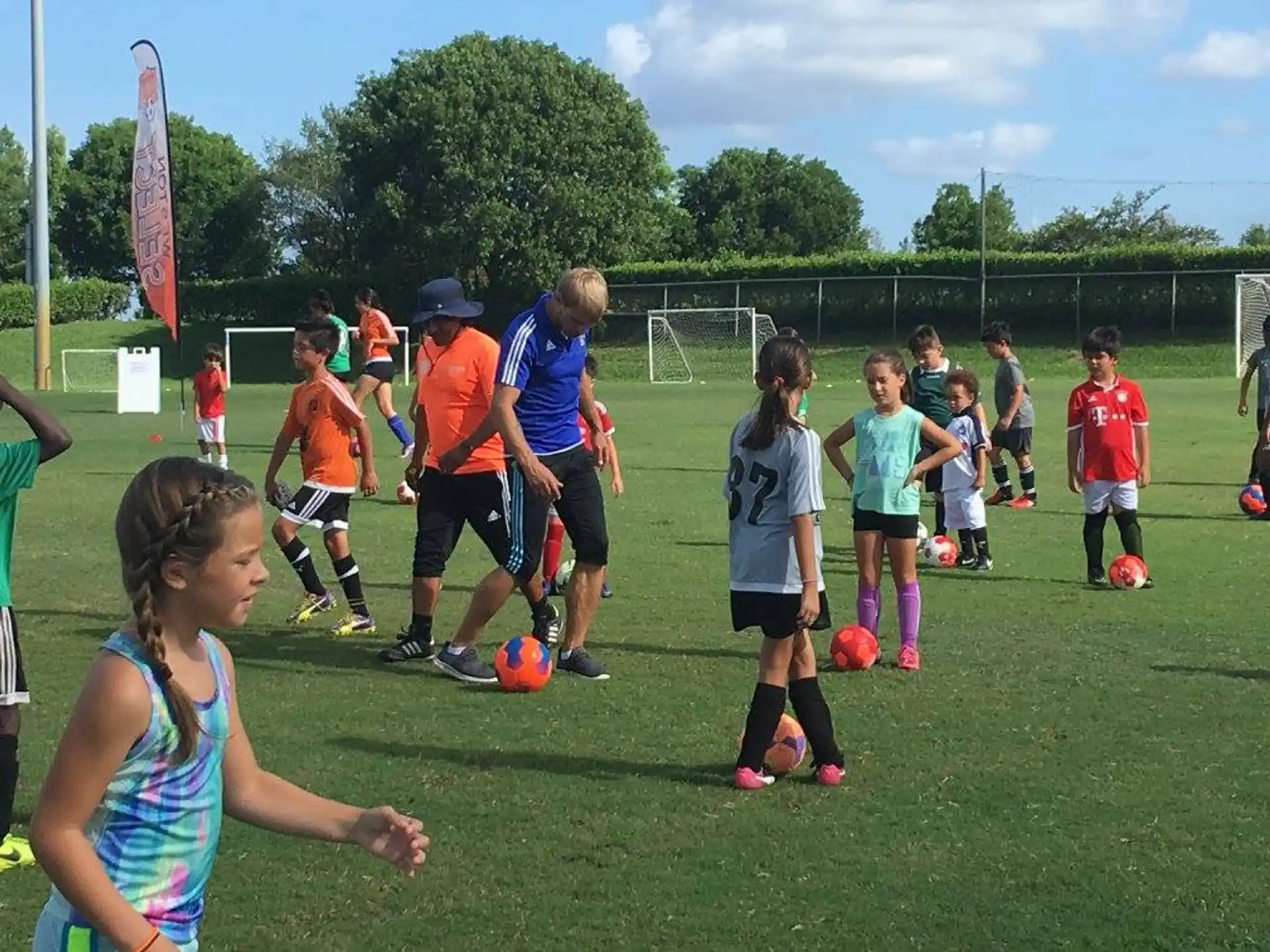 a group of kids playing football