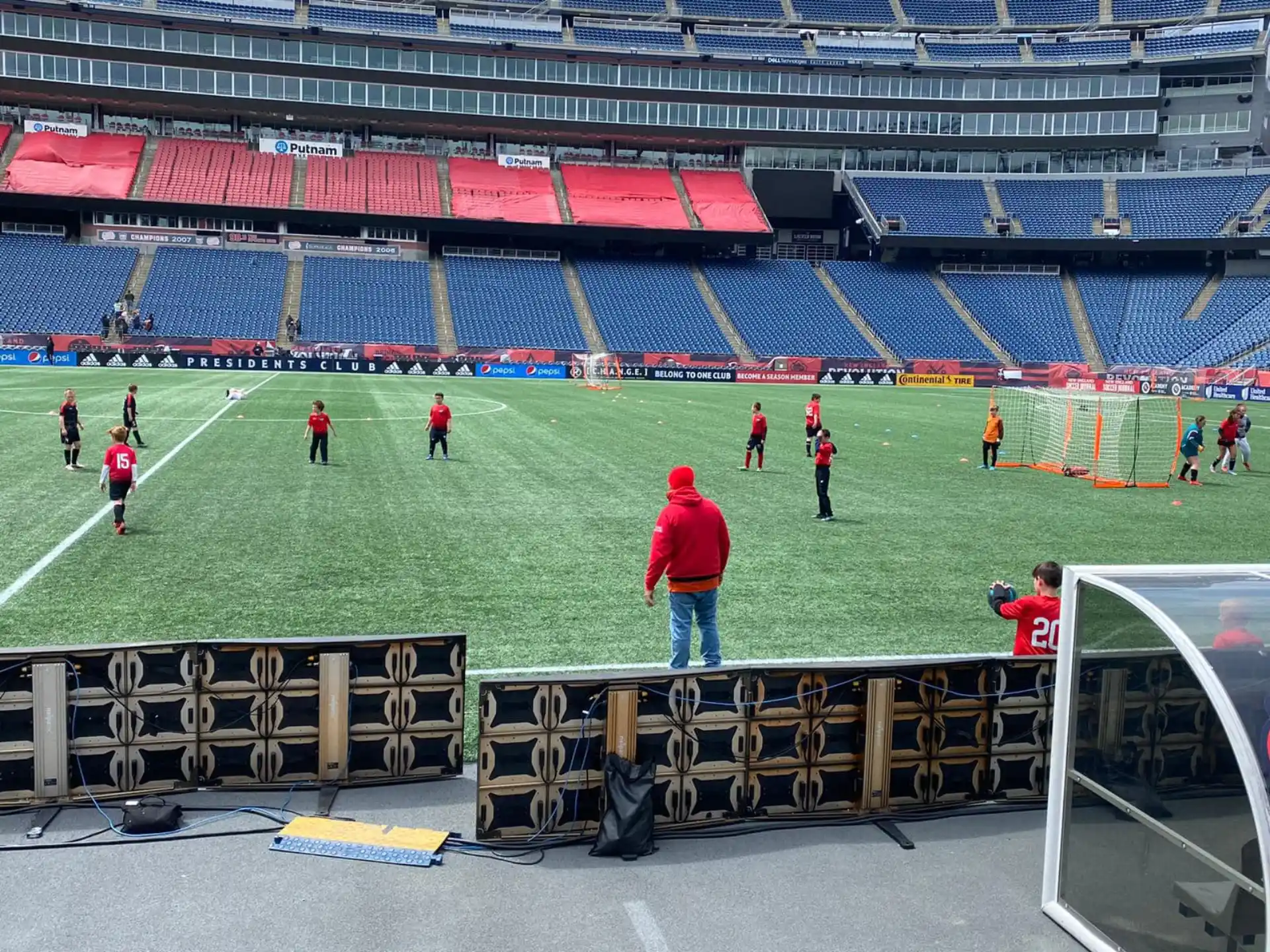 a group of people on a football field
