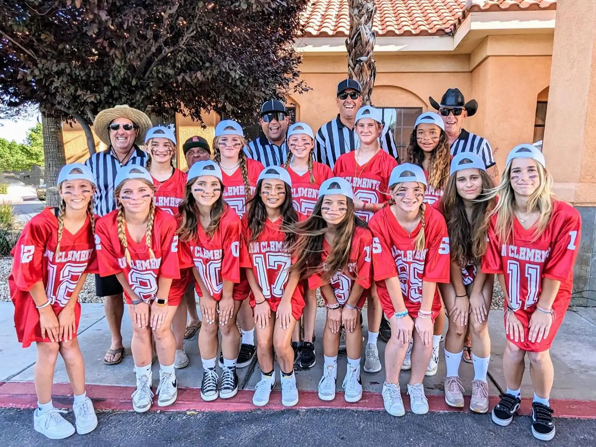 a group of people posing for a photo