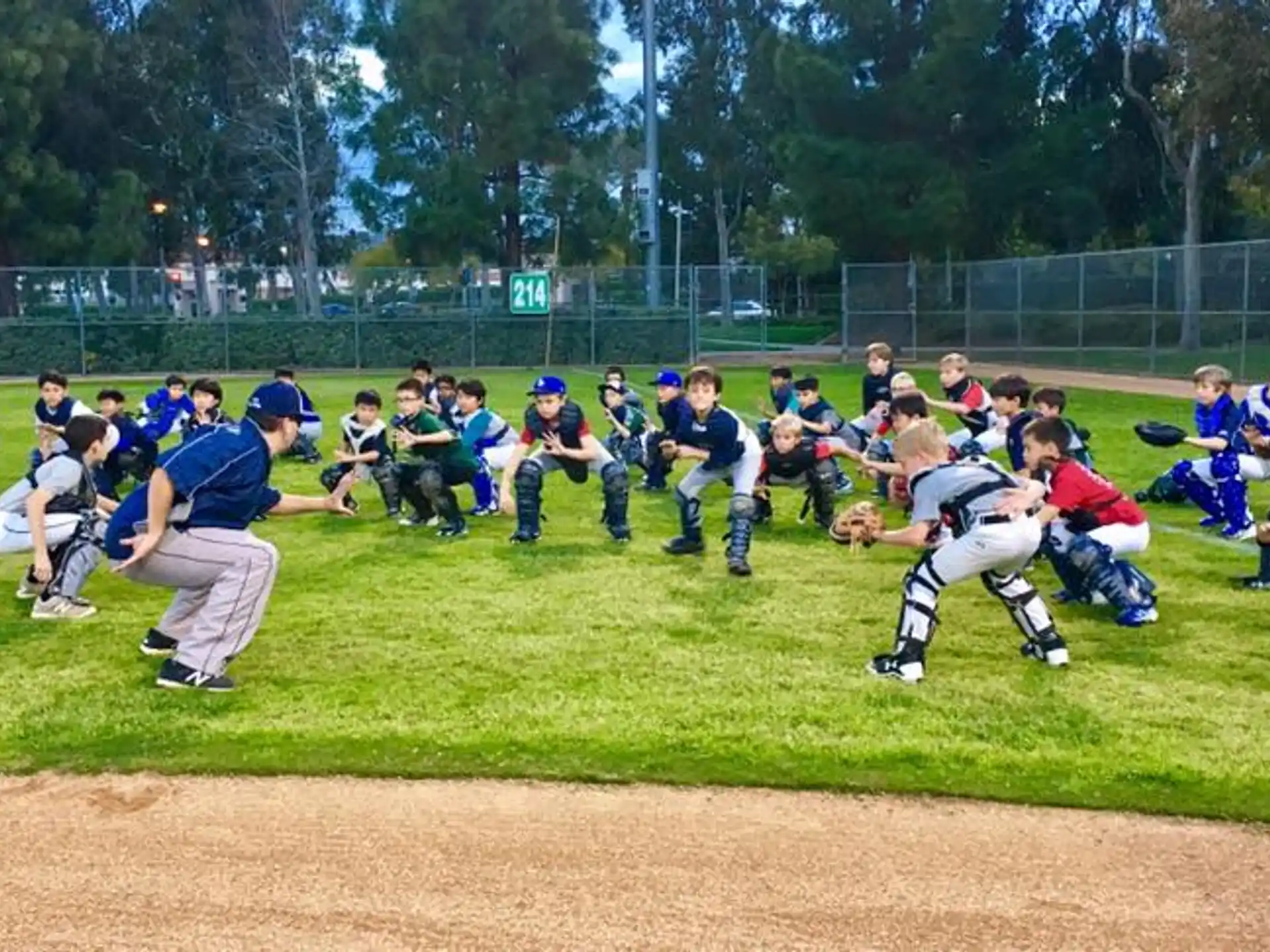 a baseball player prepares to swing a bat