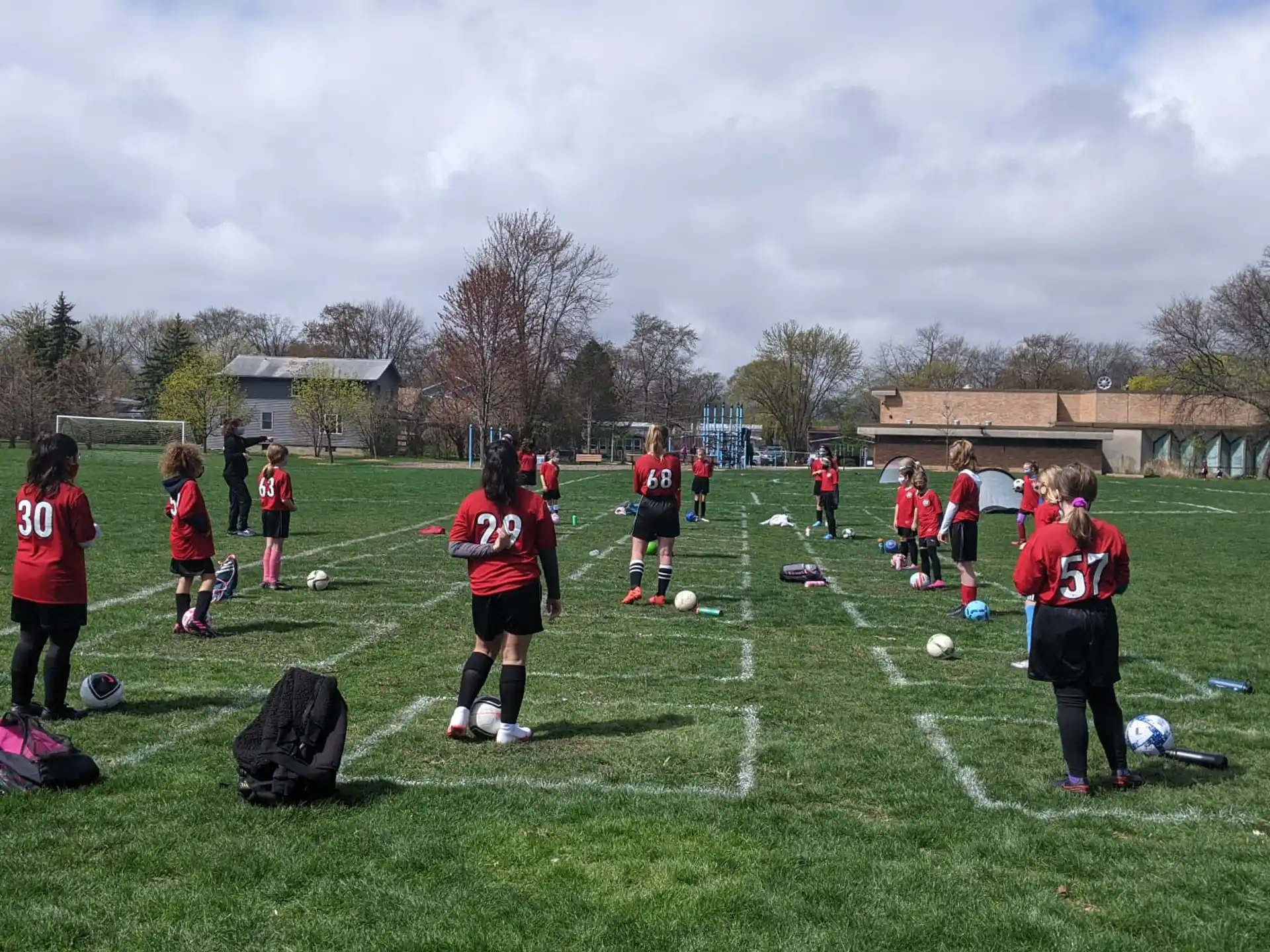 a group of kids playing football