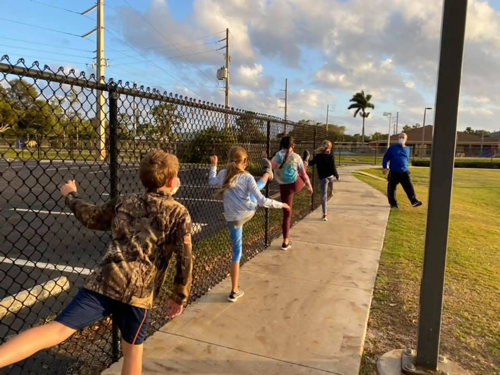 a group of people playing on a playground