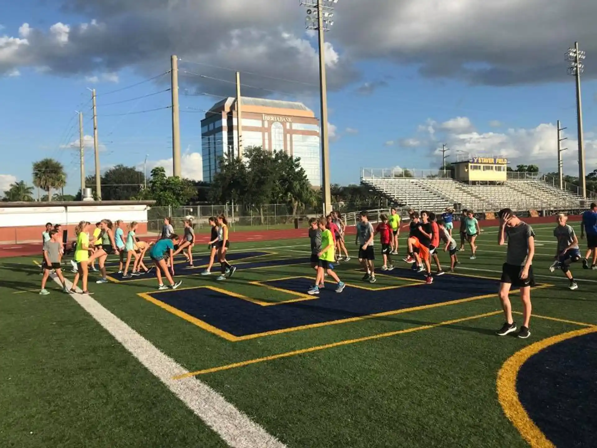 a group of people running on a track