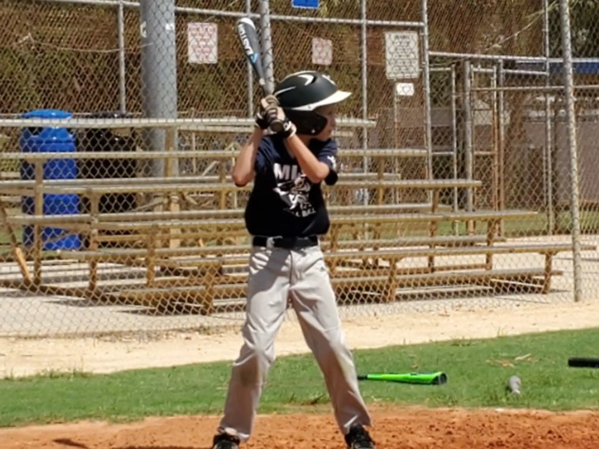 a young boy playing baseball
