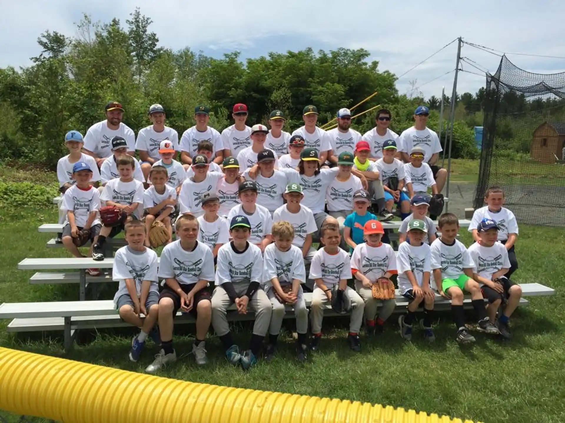 a group of people wearing baseball uniforms