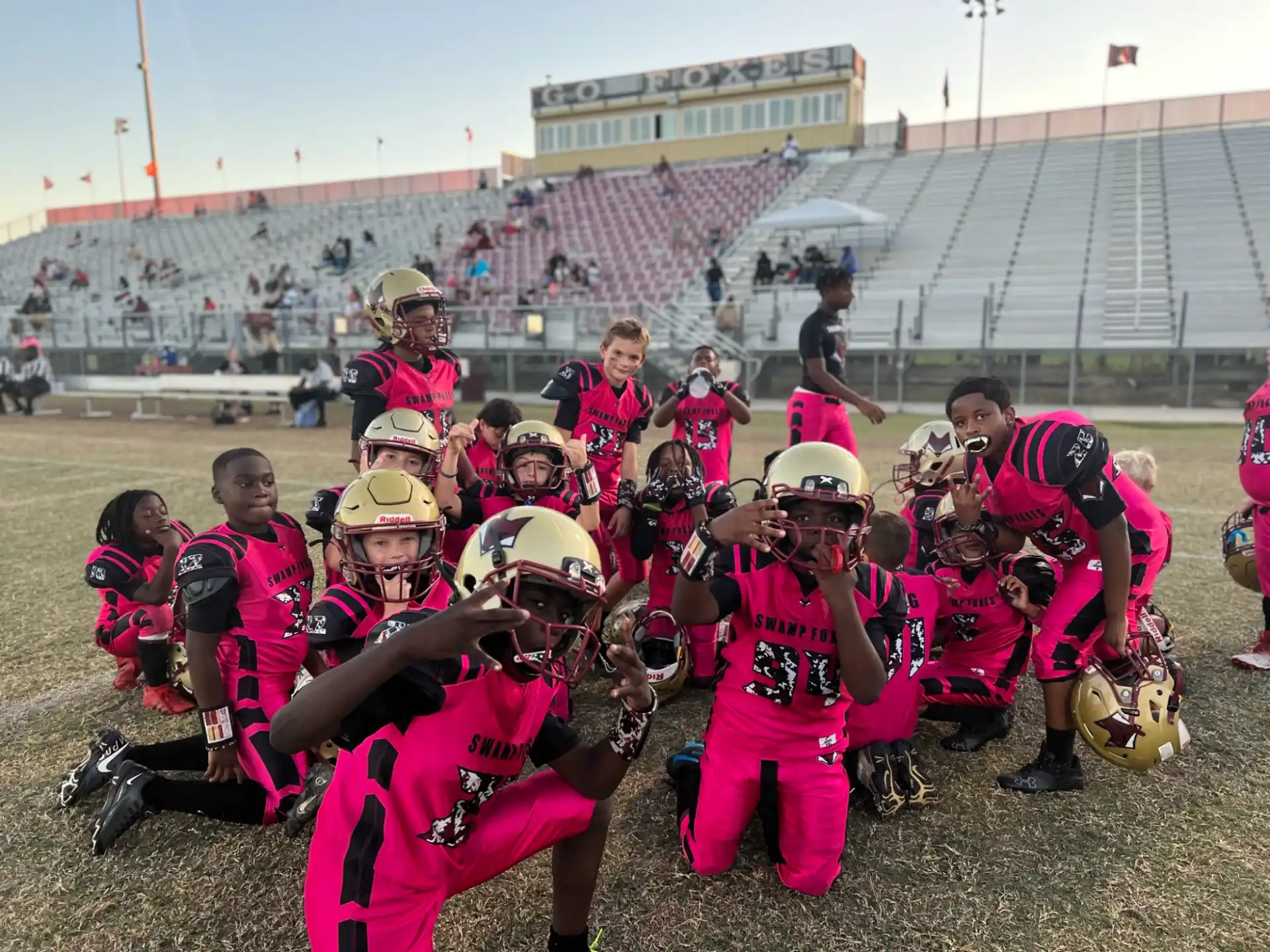 a group of people wearing football gear