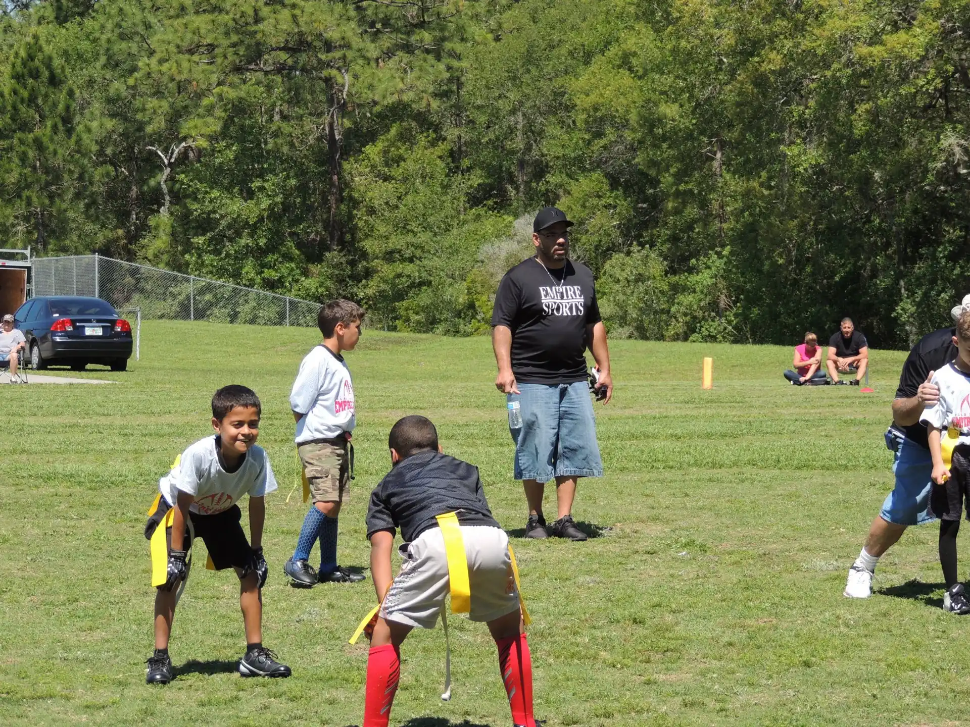 a group of people playing football