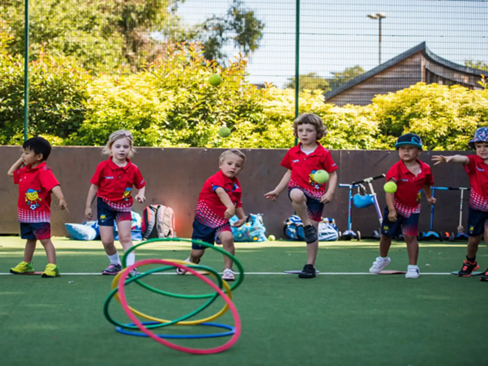 a group of kids playing with a ball