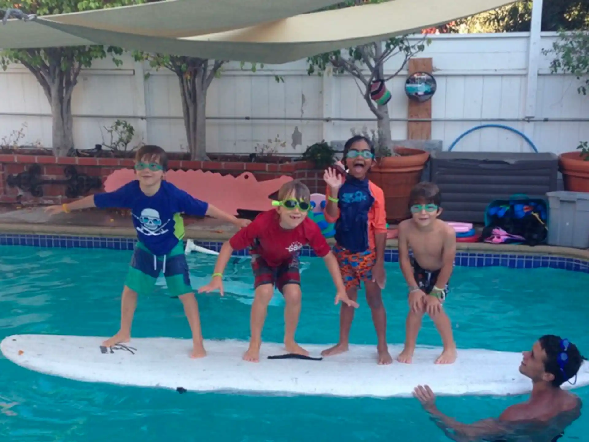 a group of people in a pool