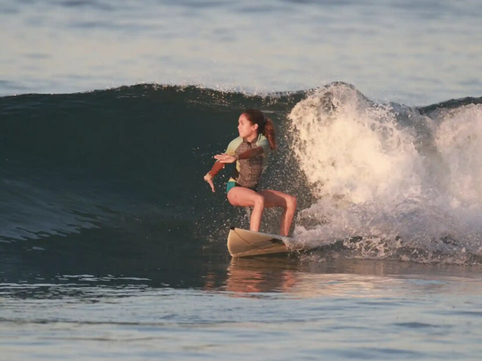 a person riding a surfboard