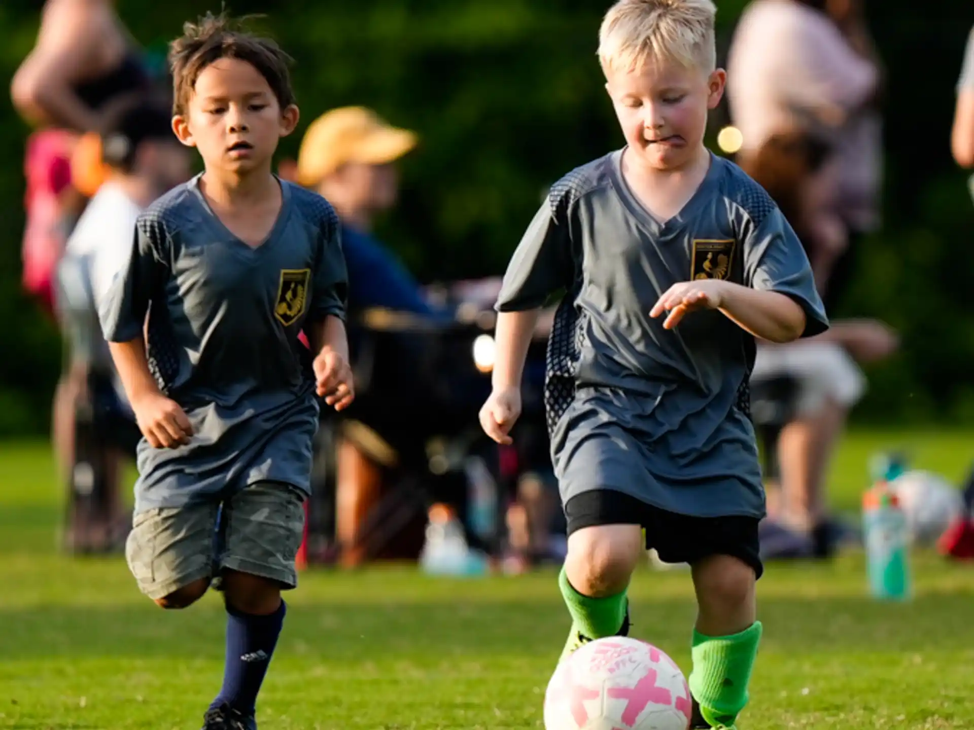 kids playing football on a field