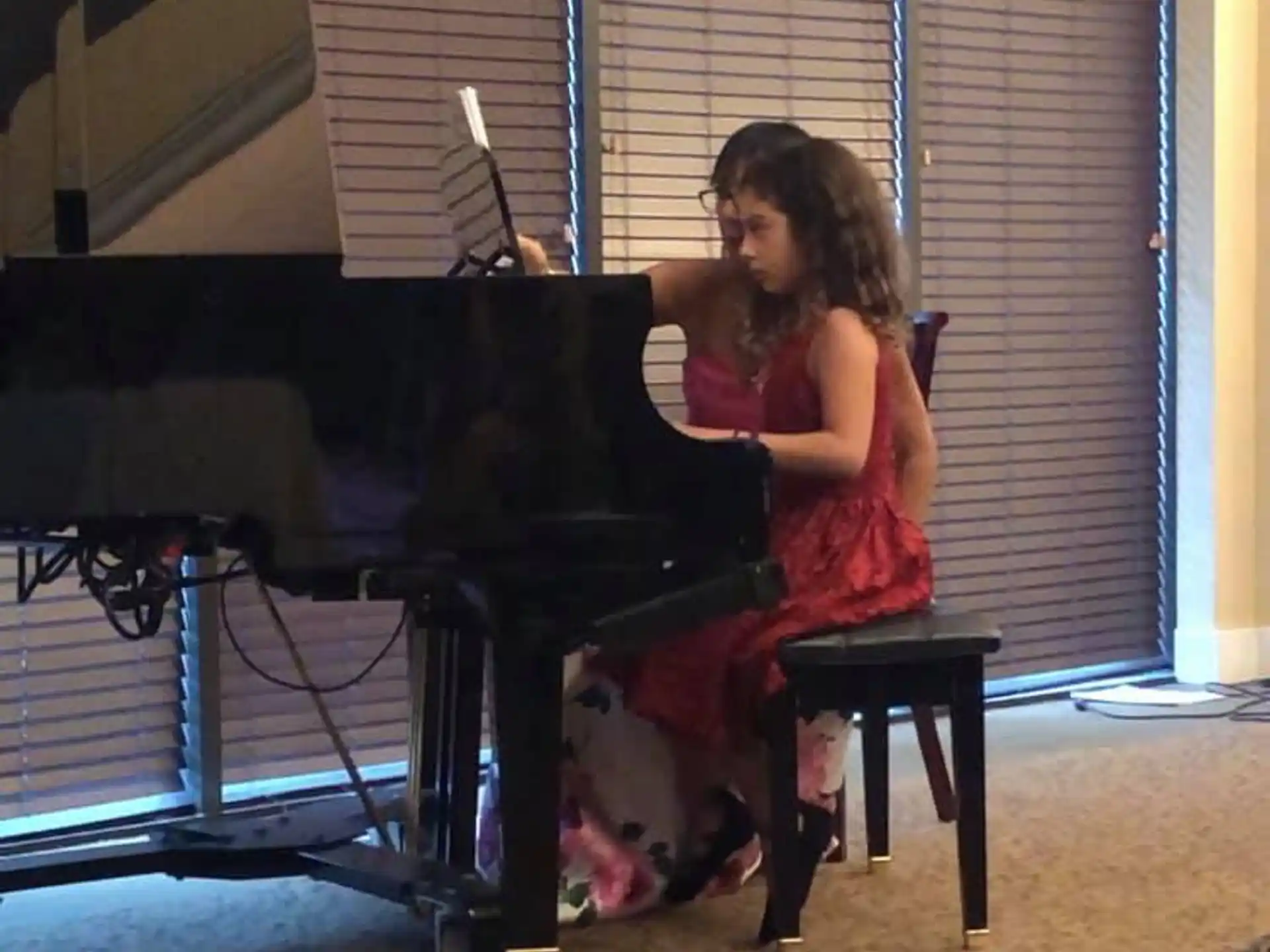 a person playing a piano