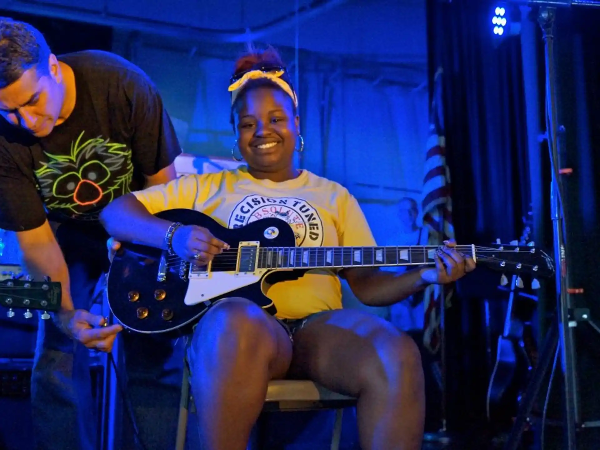 a man playing a guitar