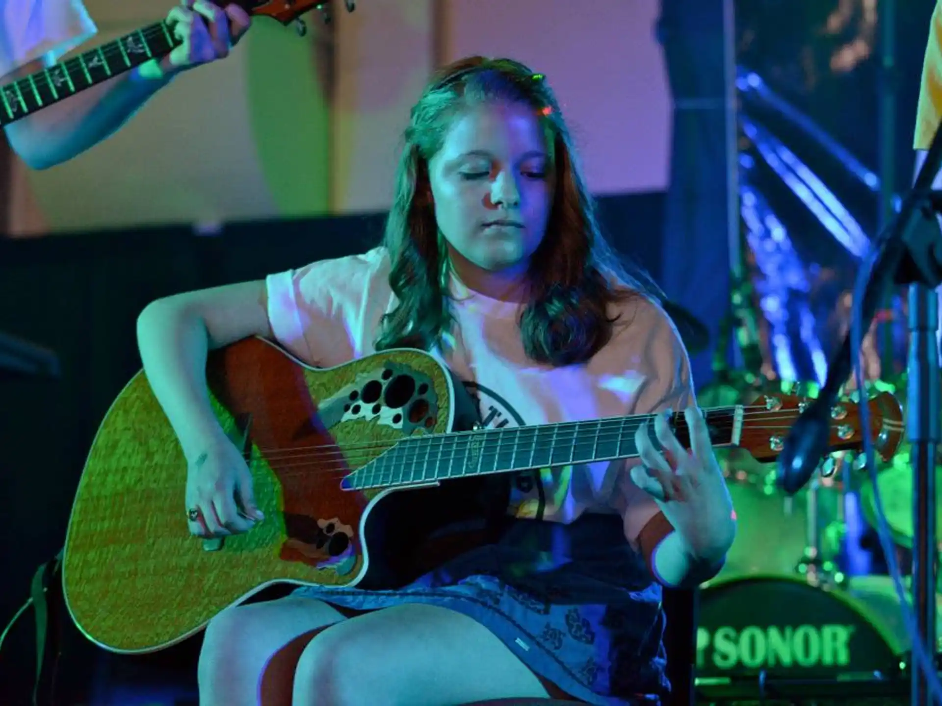 a person playing a guitar