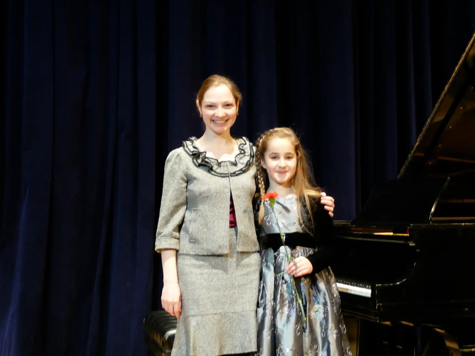 a person and a girl posing for a picture