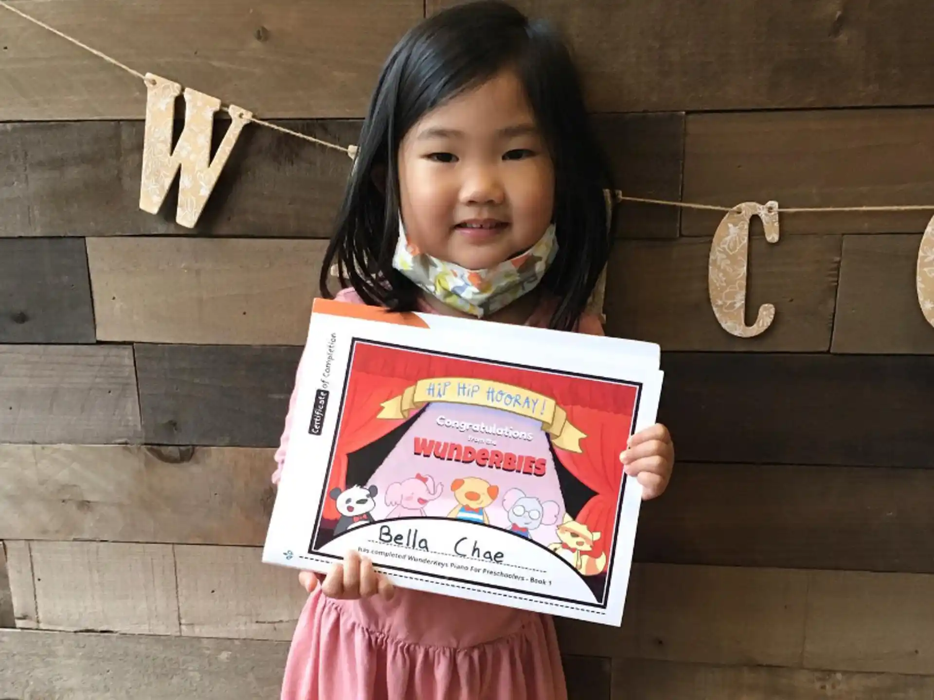 a girl holding a book