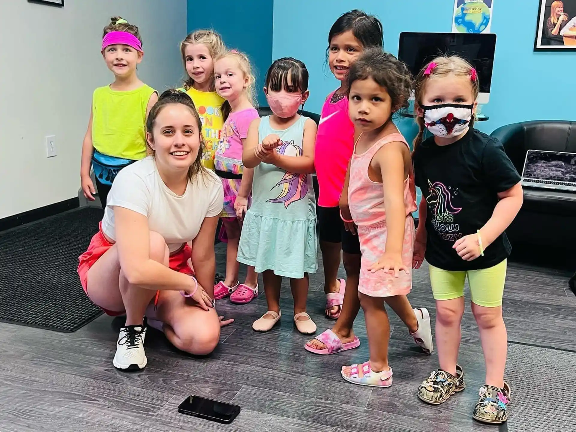 a group of children posing for a photo