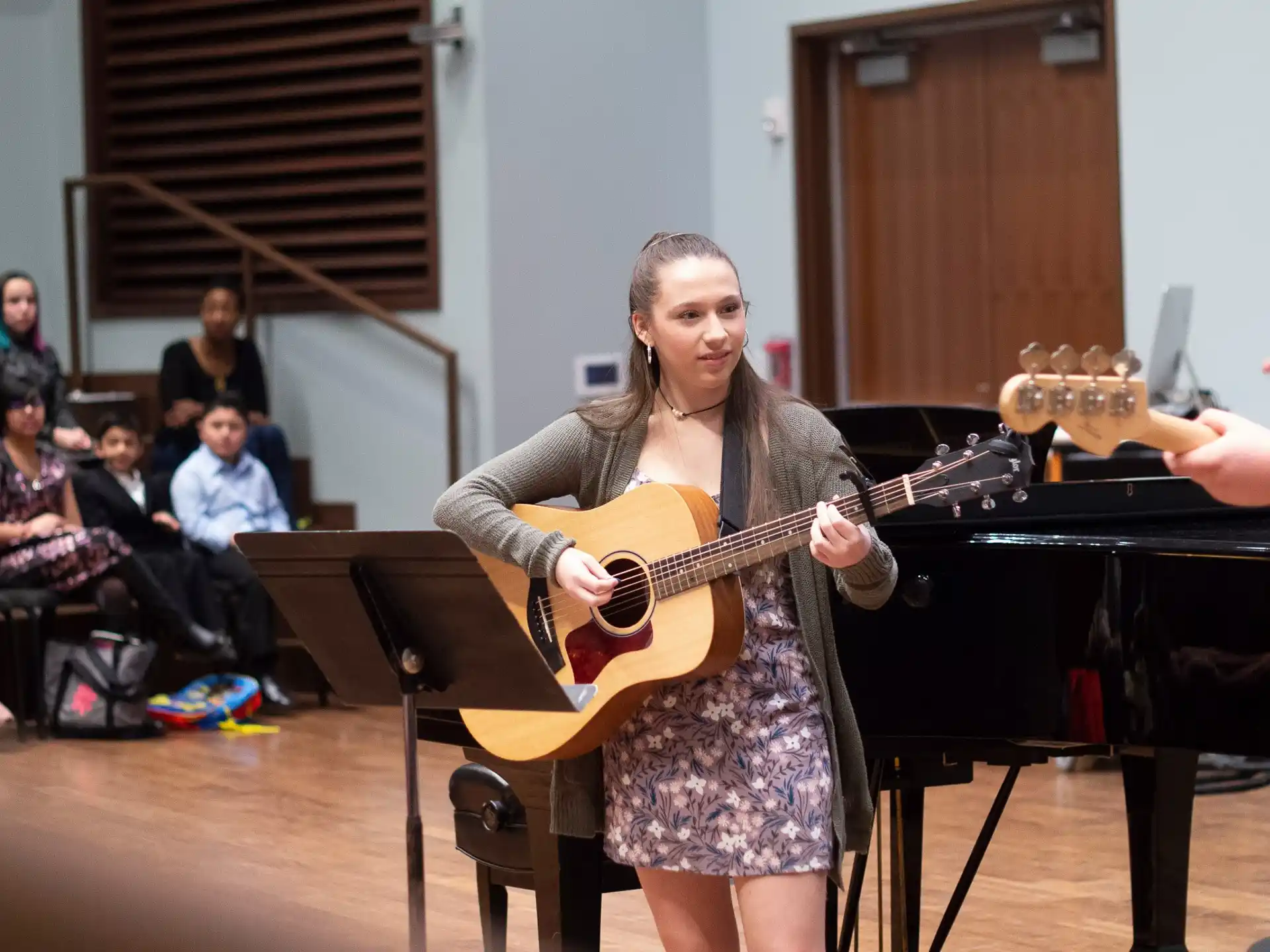 a person playing a guitar
