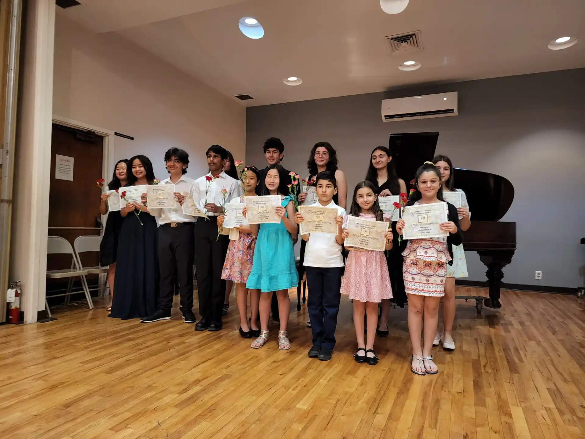 a group of people holding papers