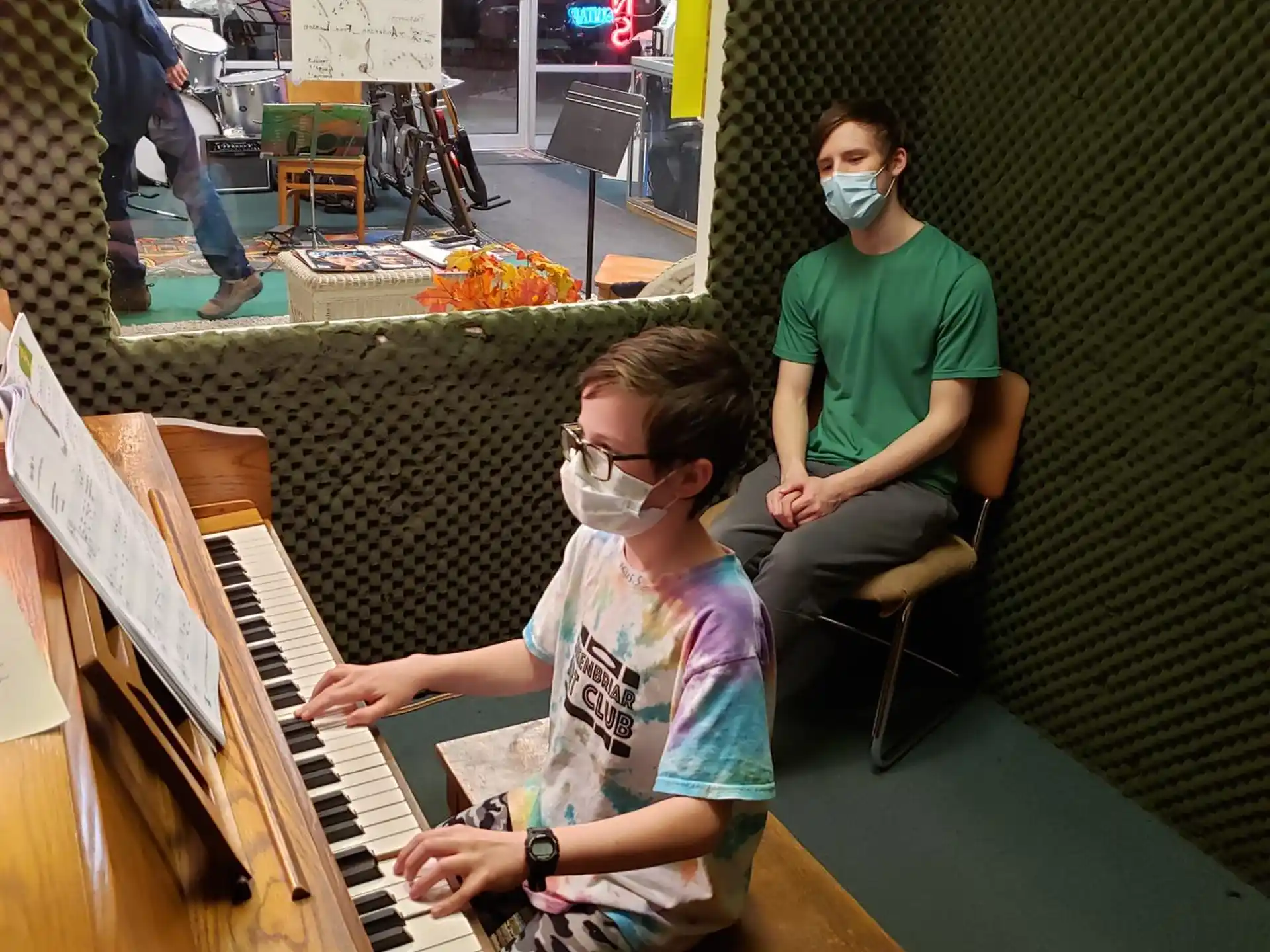 a man playing a piano