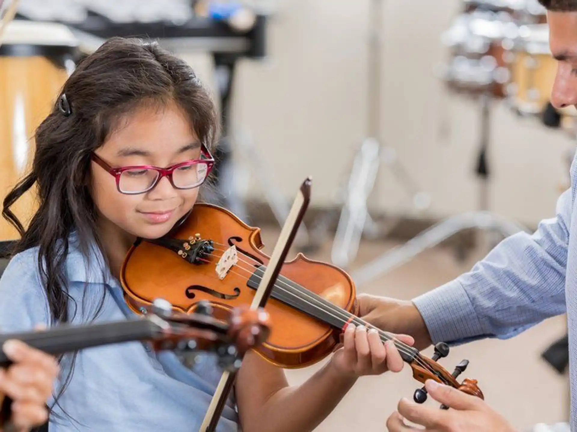 a person playing a violin