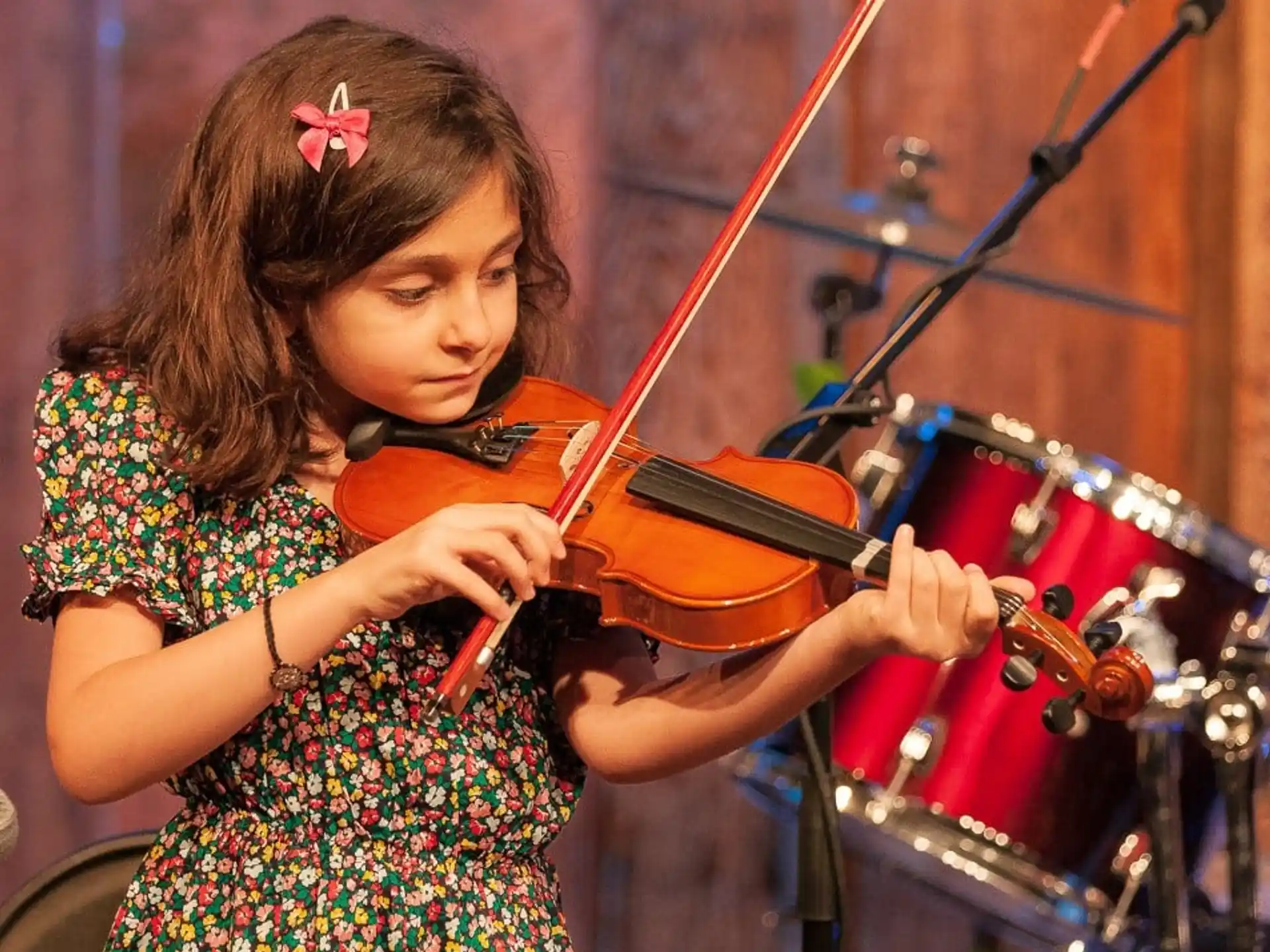 a girl playing a violin
