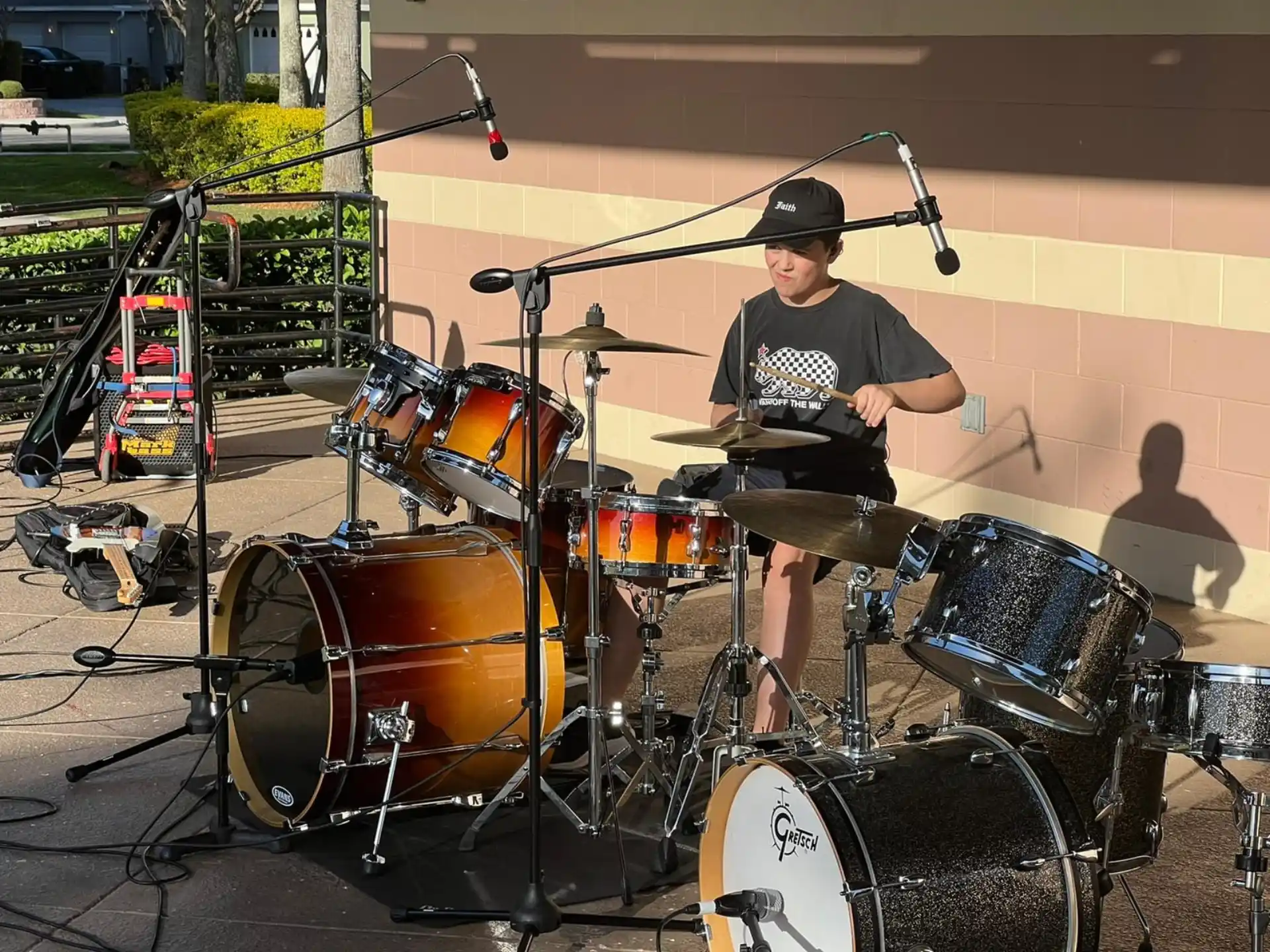 a person playing a drum set