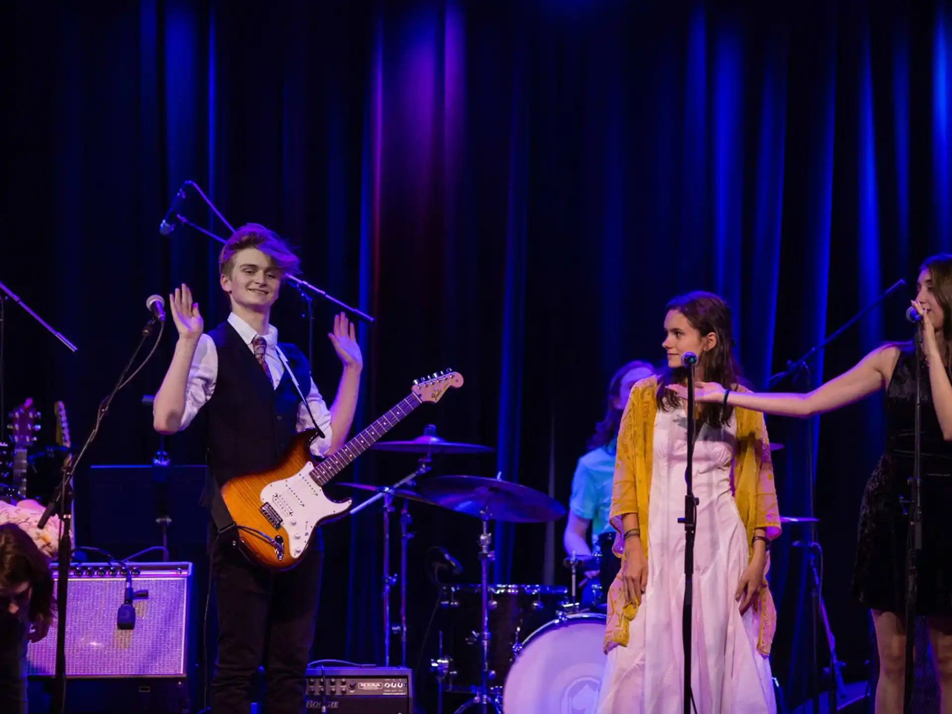 a group of people on a stage