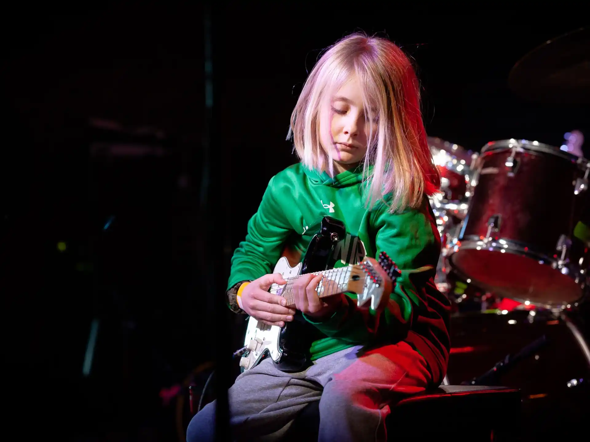 a person playing a guitar