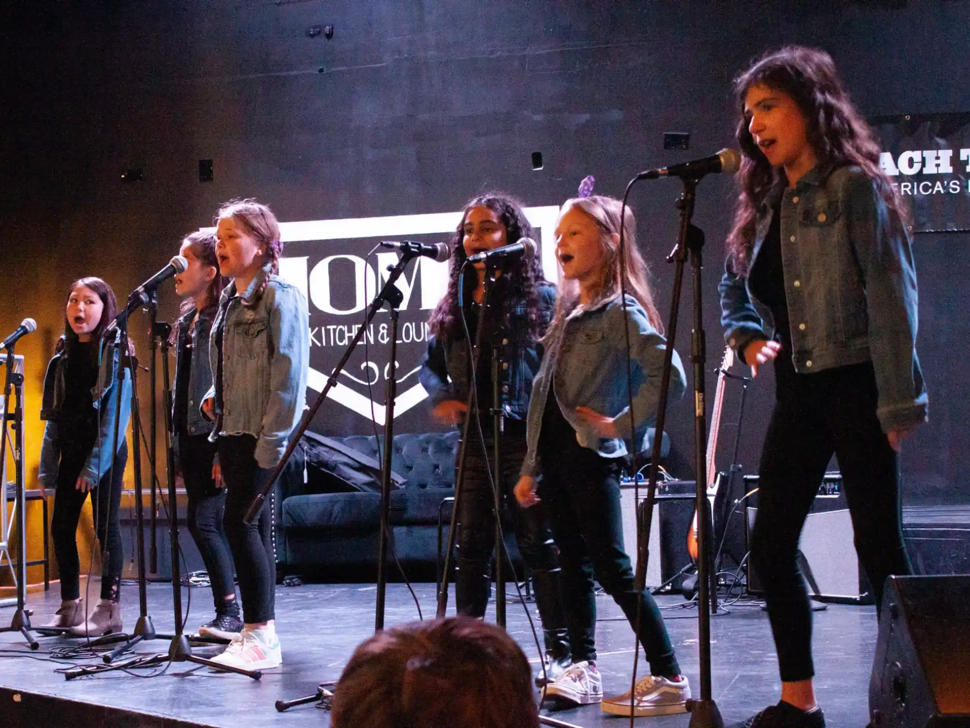 a group of people on a stage