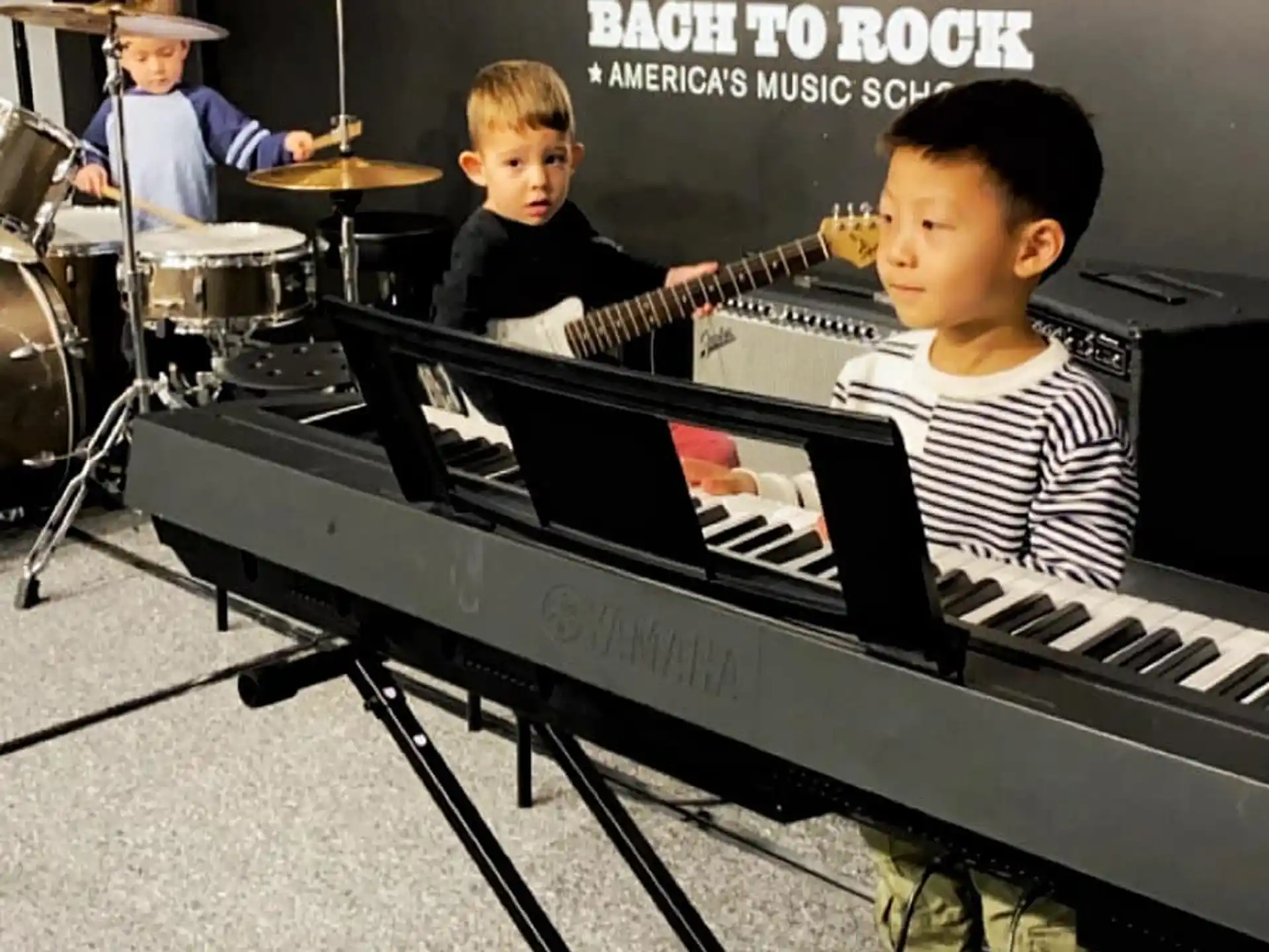 a couple of boys playing instruments