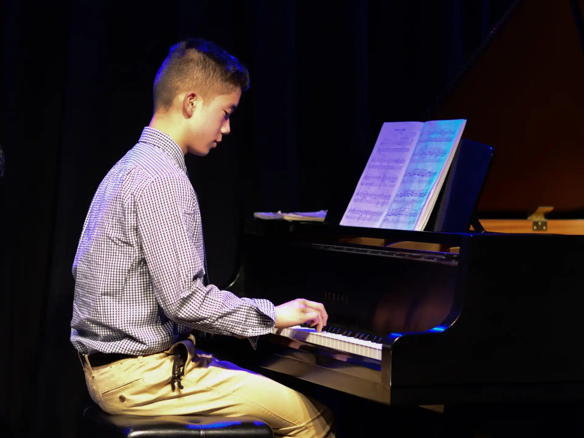 a person playing a piano