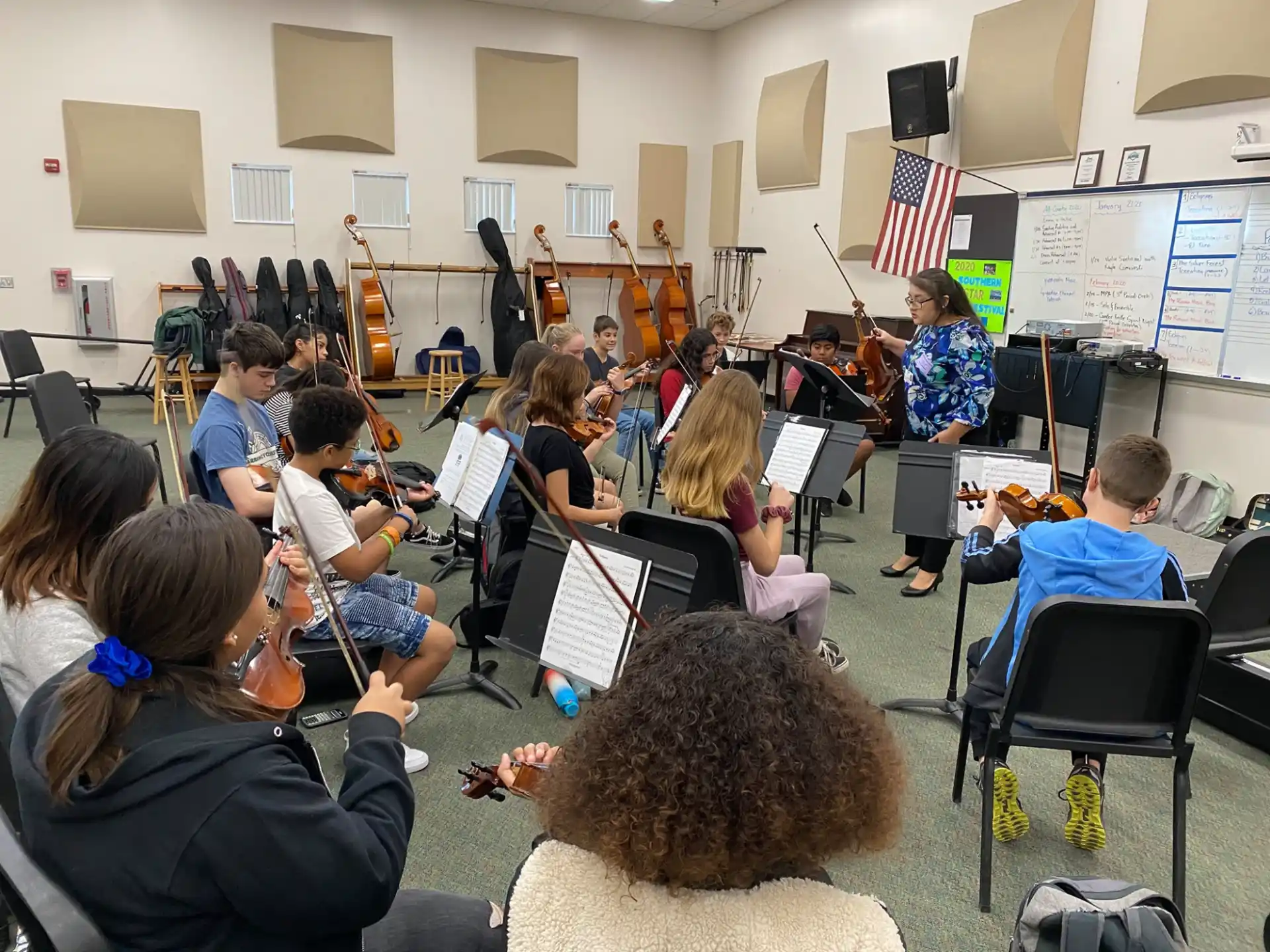a group of children playing musical instruments