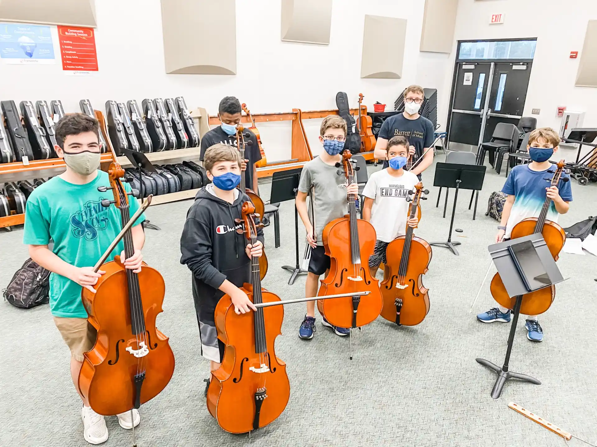 a group of people wearing masks and playing instruments