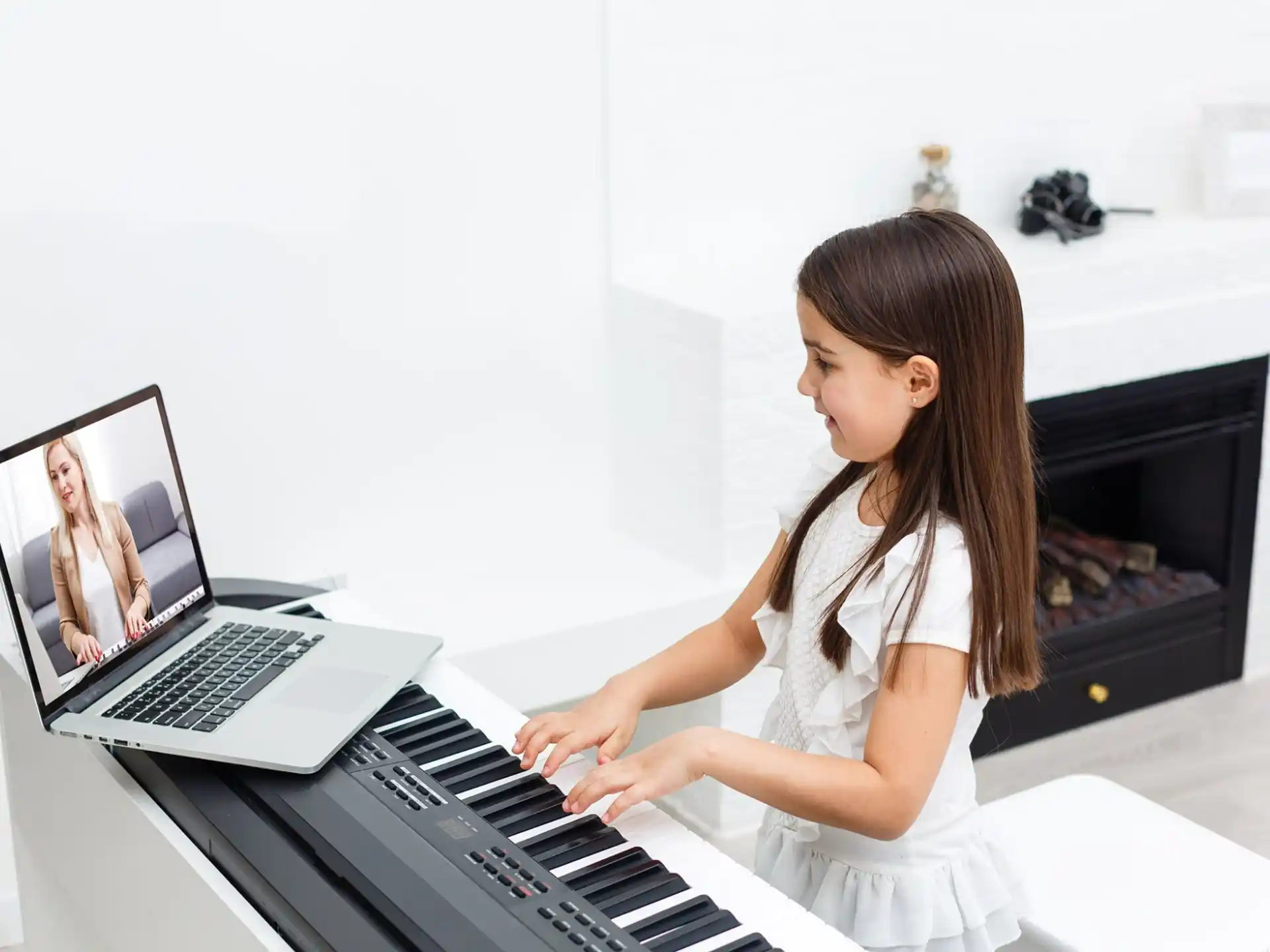 a woman playing a piano