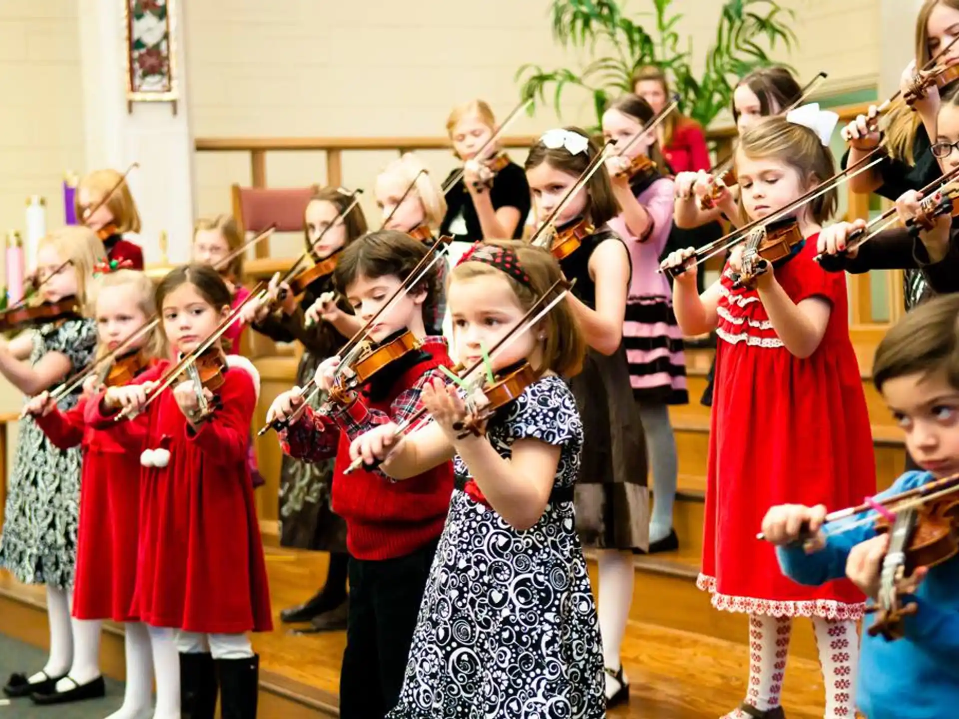 a group of children playing instruments