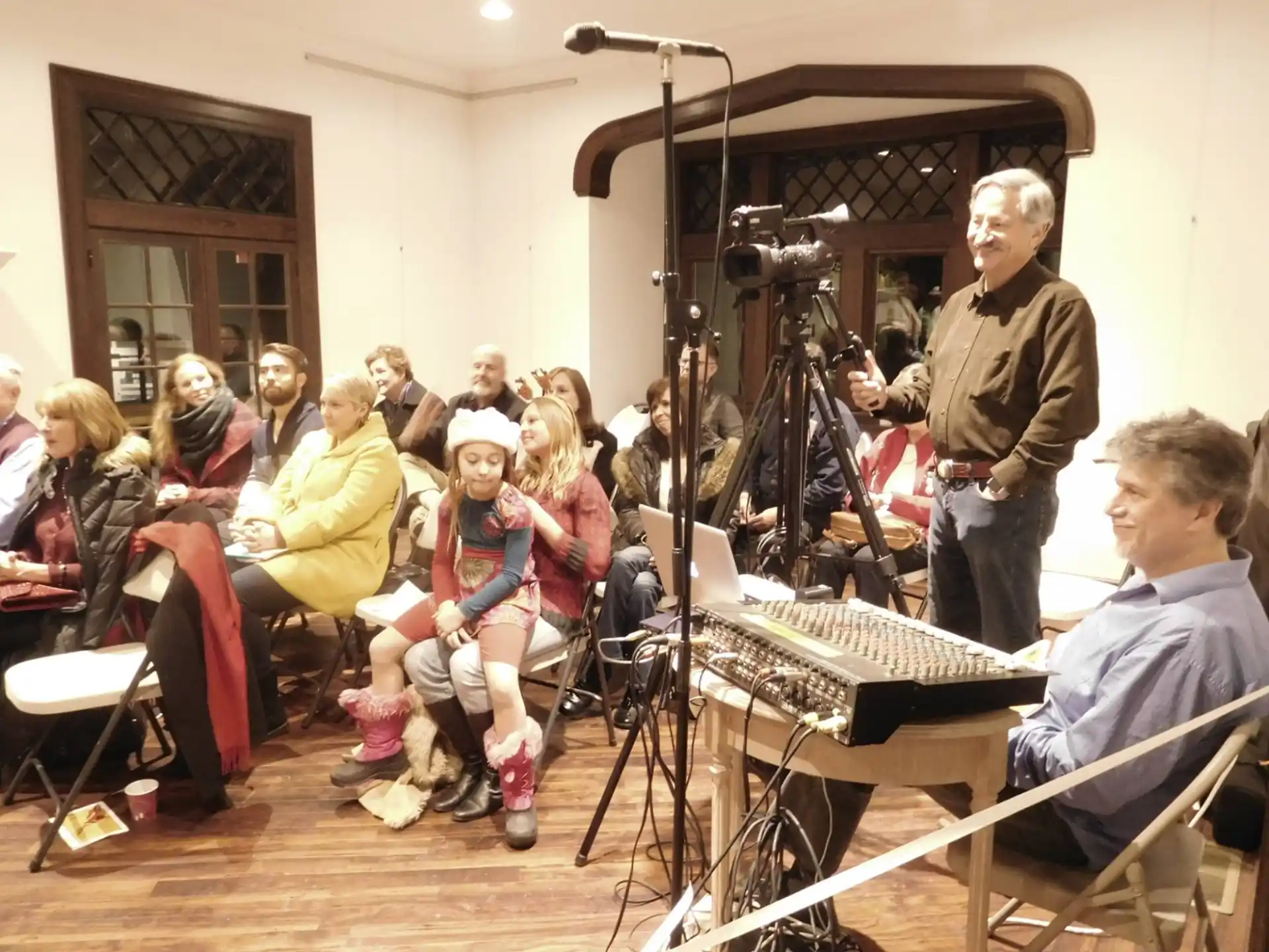 a person recording a group of people