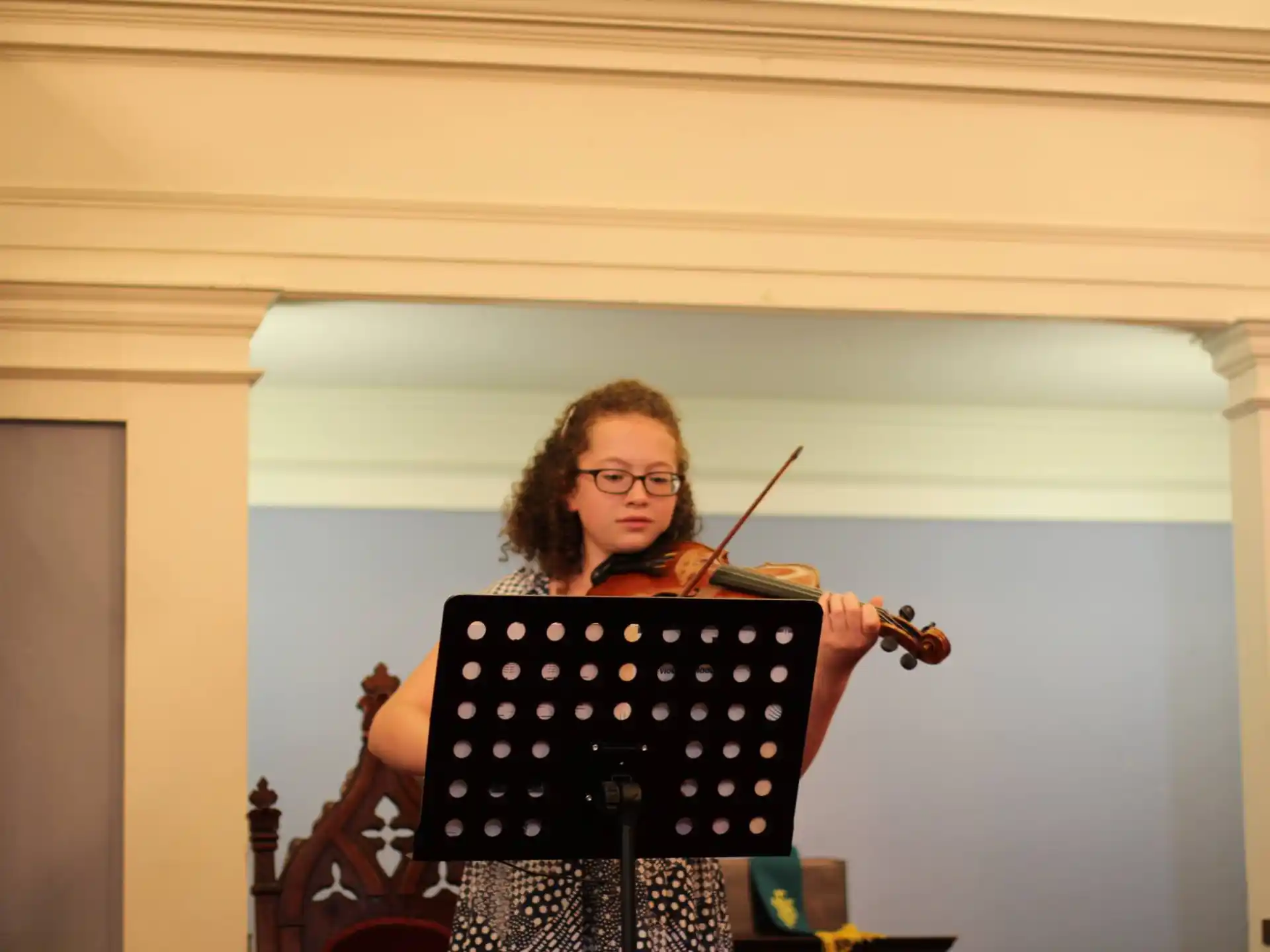 a person playing a violin