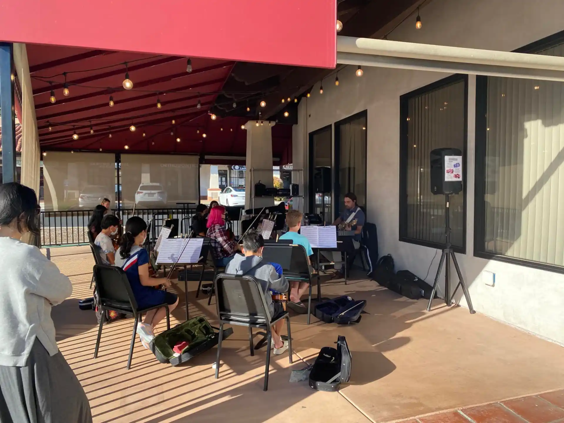 a group of people sitting at tables