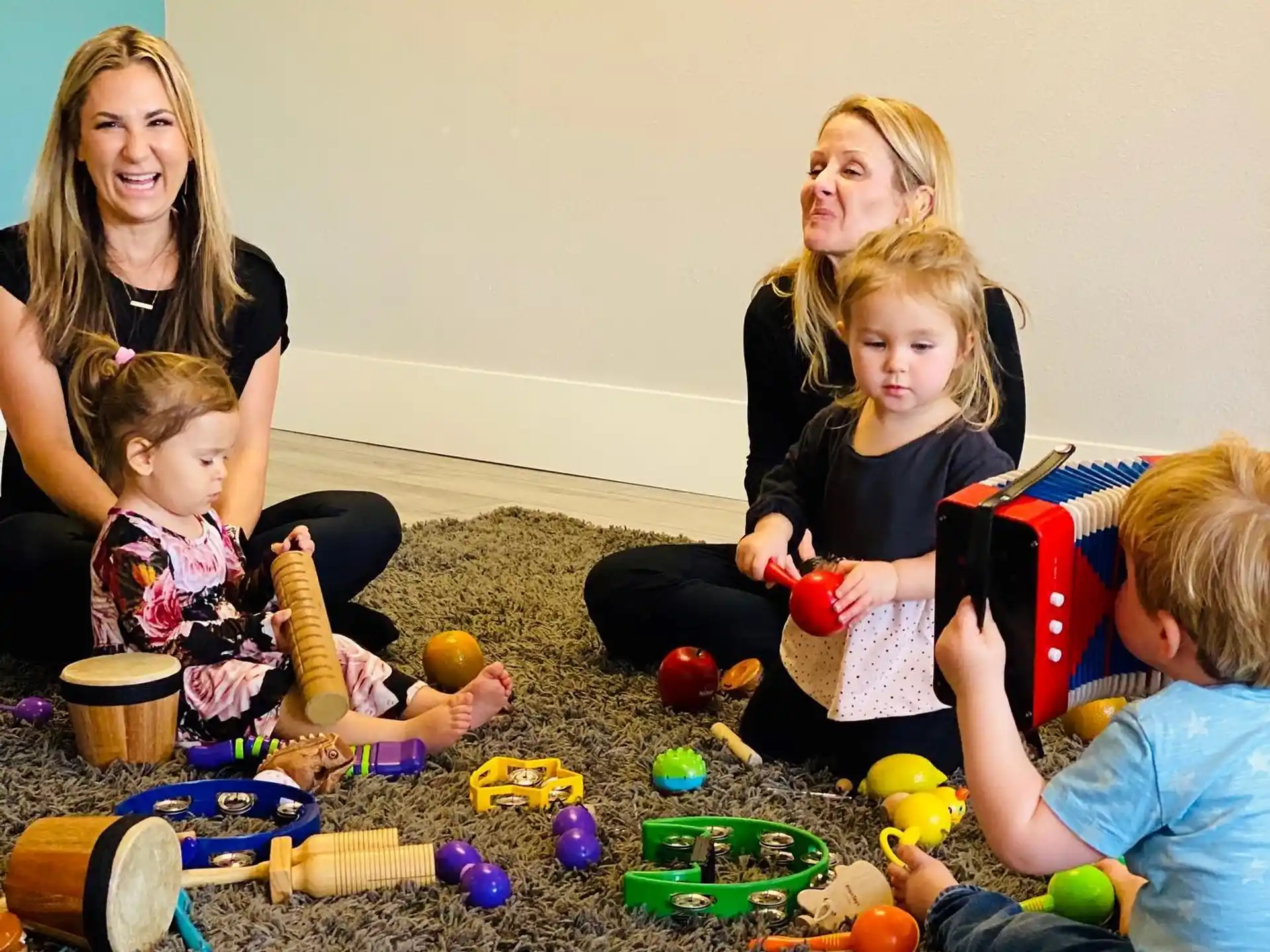 a group of children playing with toys