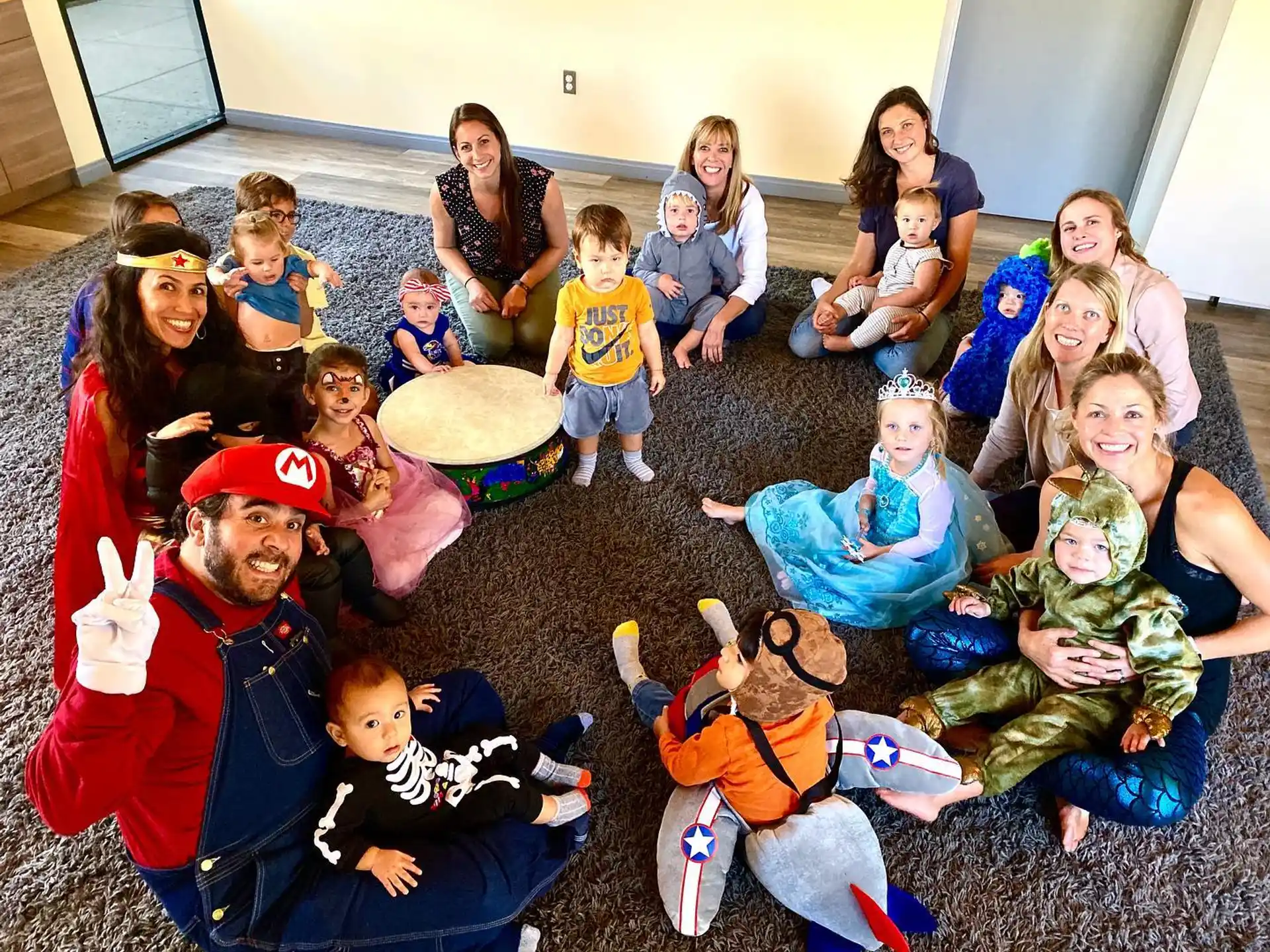 a group of people sitting on the floor