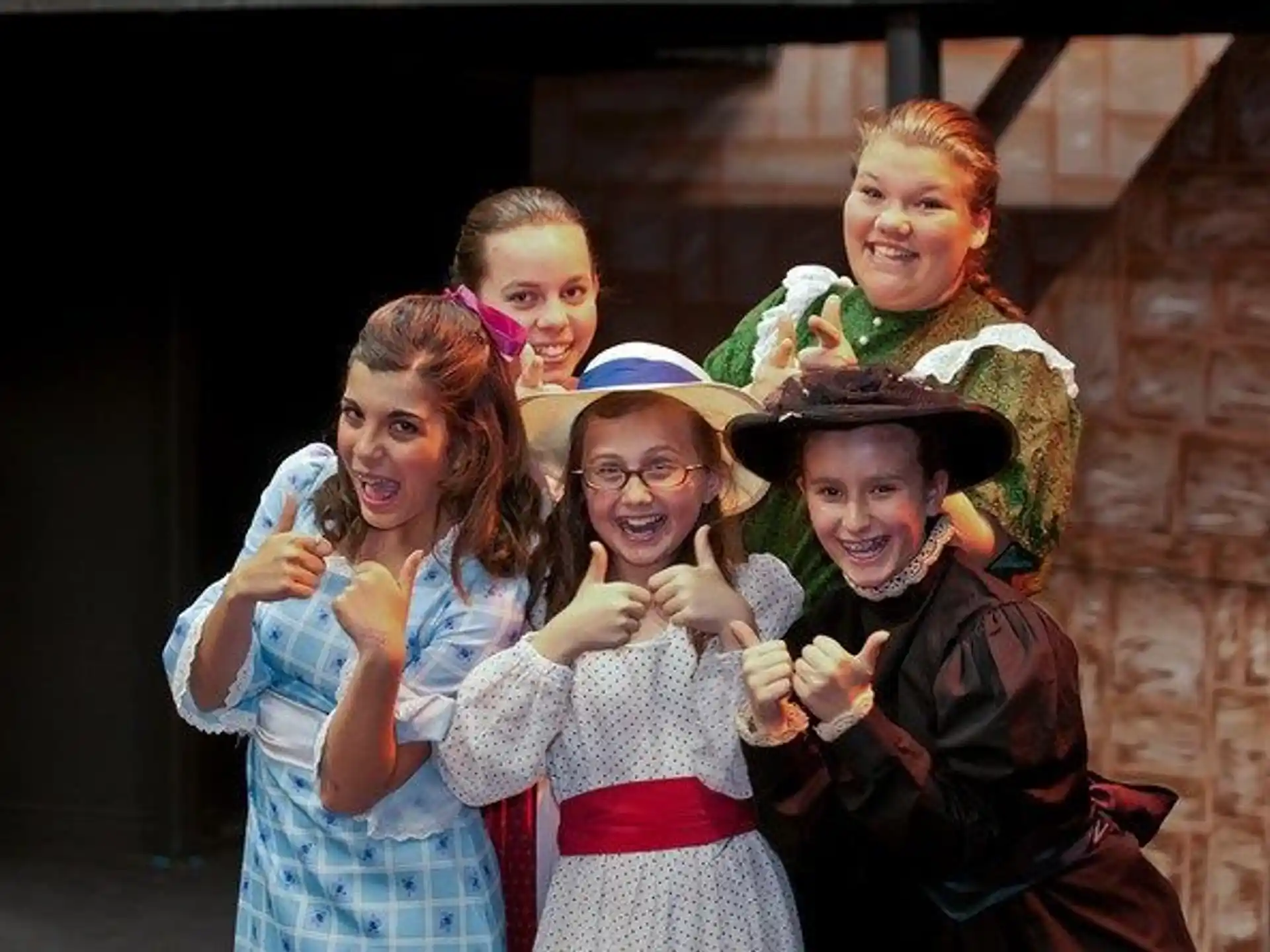 a group of people posing for the camera