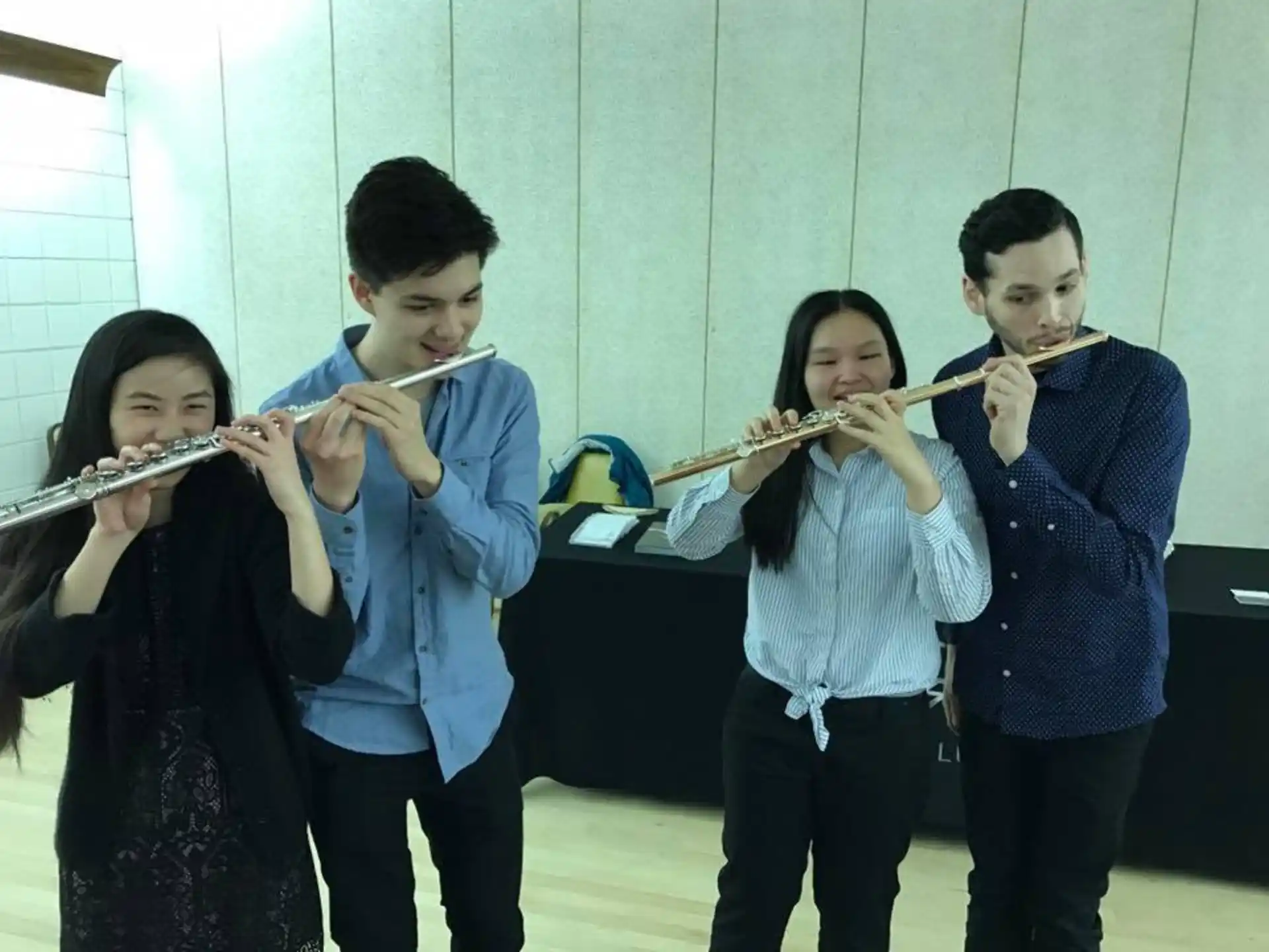 a group of kids playing instruments